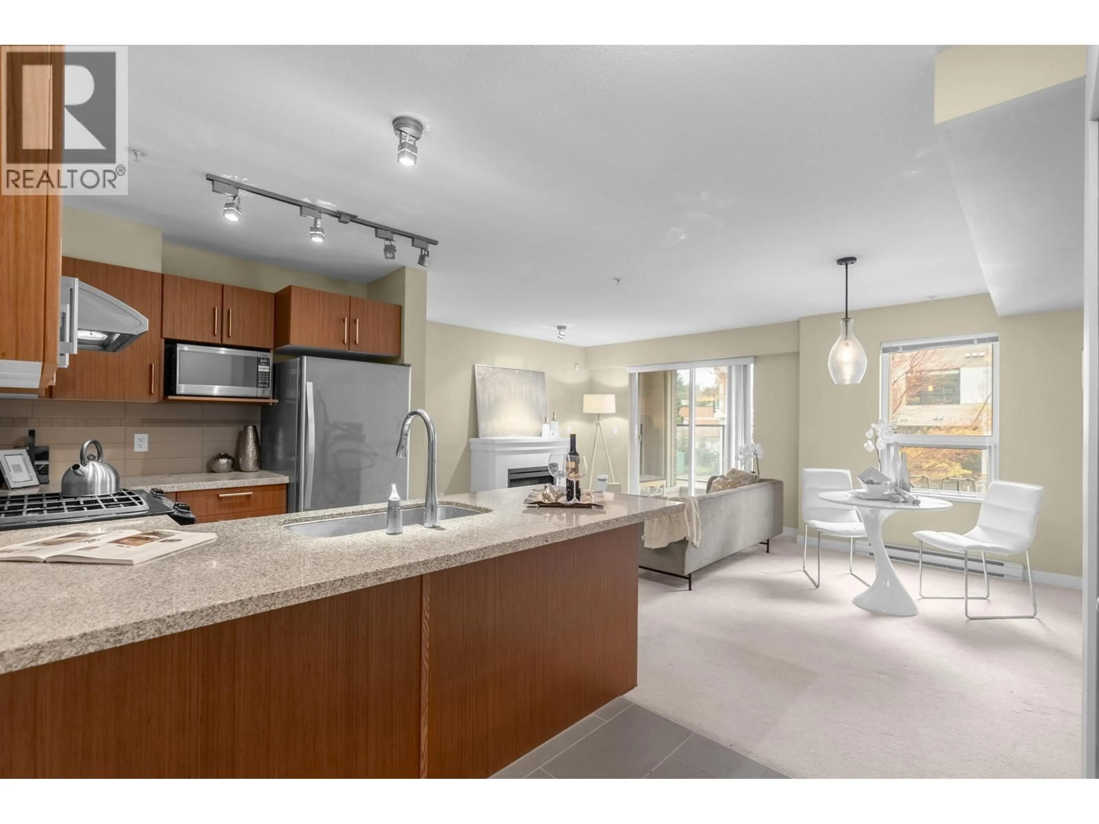 Open concept kitchen, unknown for 102 - 6800 ECKERSLEY ROAD, Richmond British Columbia V6Y0E7