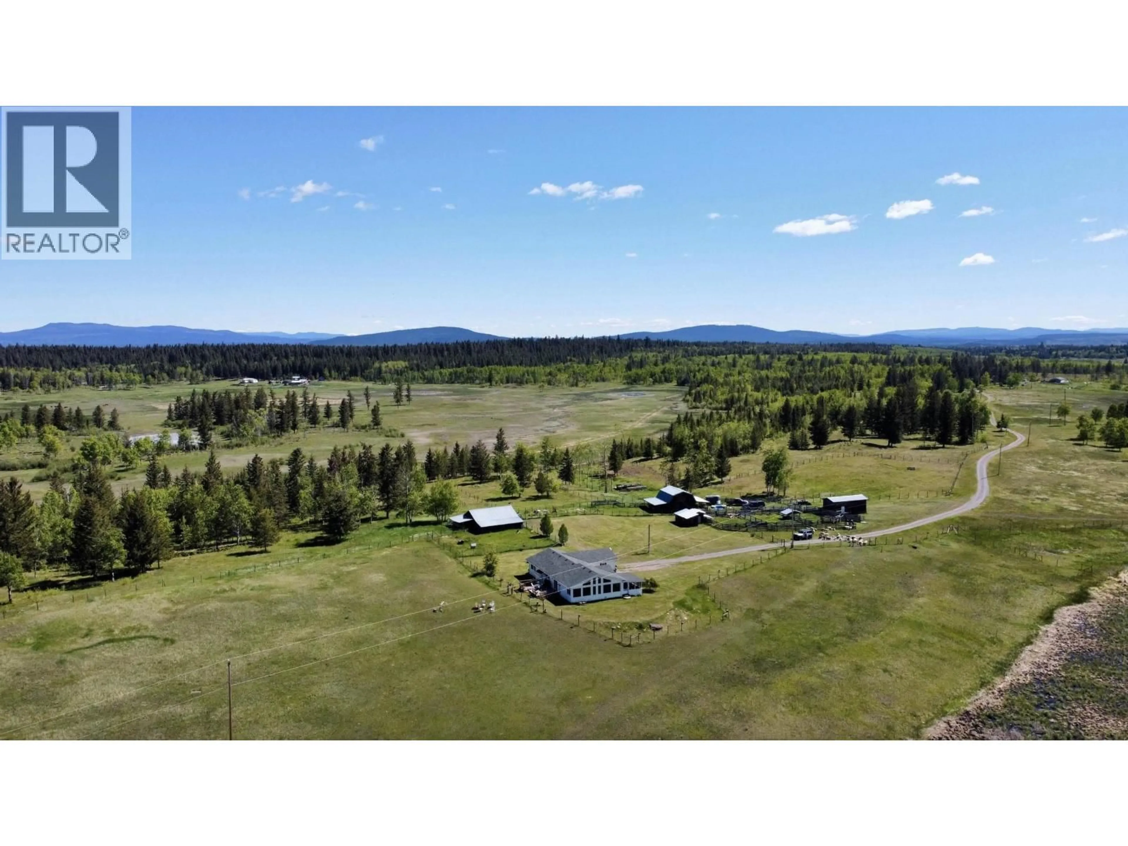A pic from outside/outdoor area/front of a property/back of a property/a pic from drone, mountain view for 5028 ABEL LAKE ROAD, 100 Mile House British Columbia V0K2E1