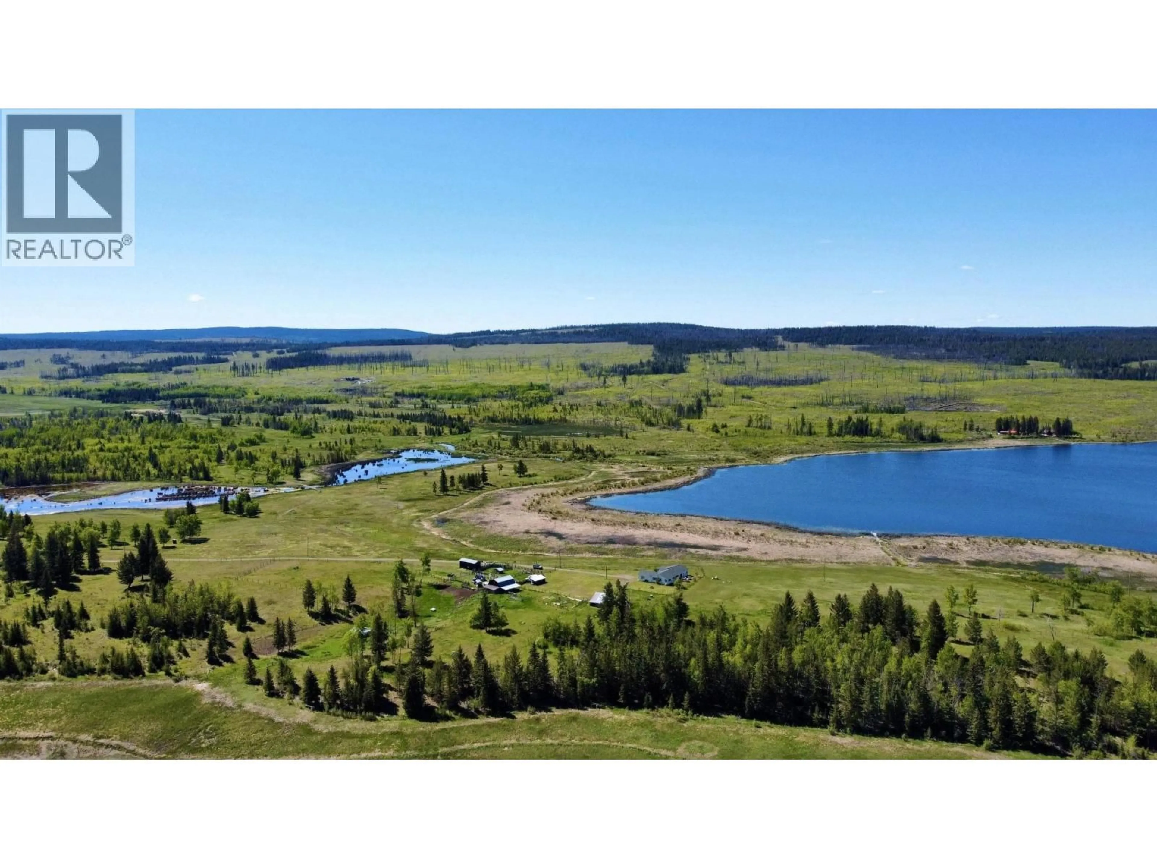 A pic from outside/outdoor area/front of a property/back of a property/a pic from drone, water/lake/river/ocean view for 5028 ABEL LAKE ROAD, 100 Mile House British Columbia V0K2E1