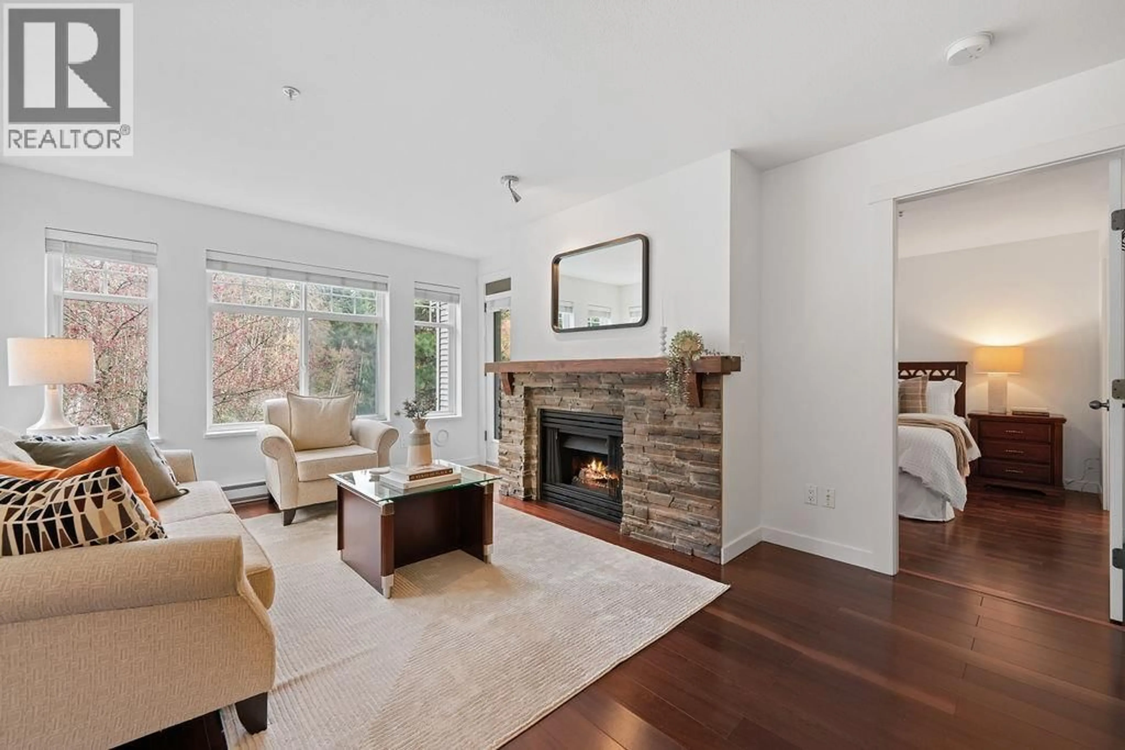 Living room with furniture, unknown for 304 - 1420 PARKWAY BOULEVARD, Coquitlam British Columbia V3E3J6