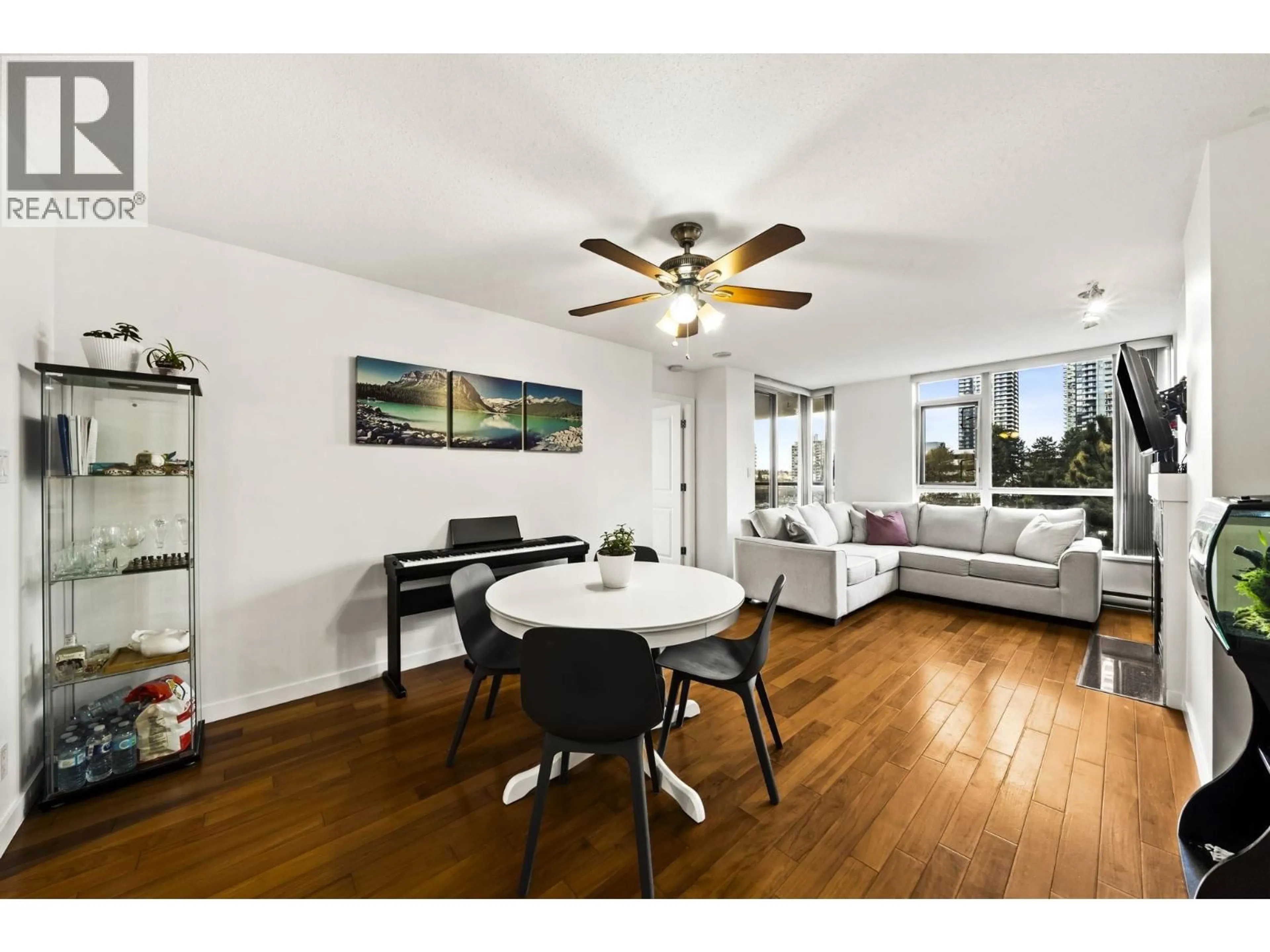 Living room with furniture, wood/laminate floor for 503 - 2088 MADISON AVENUE, Burnaby British Columbia V5C6T5