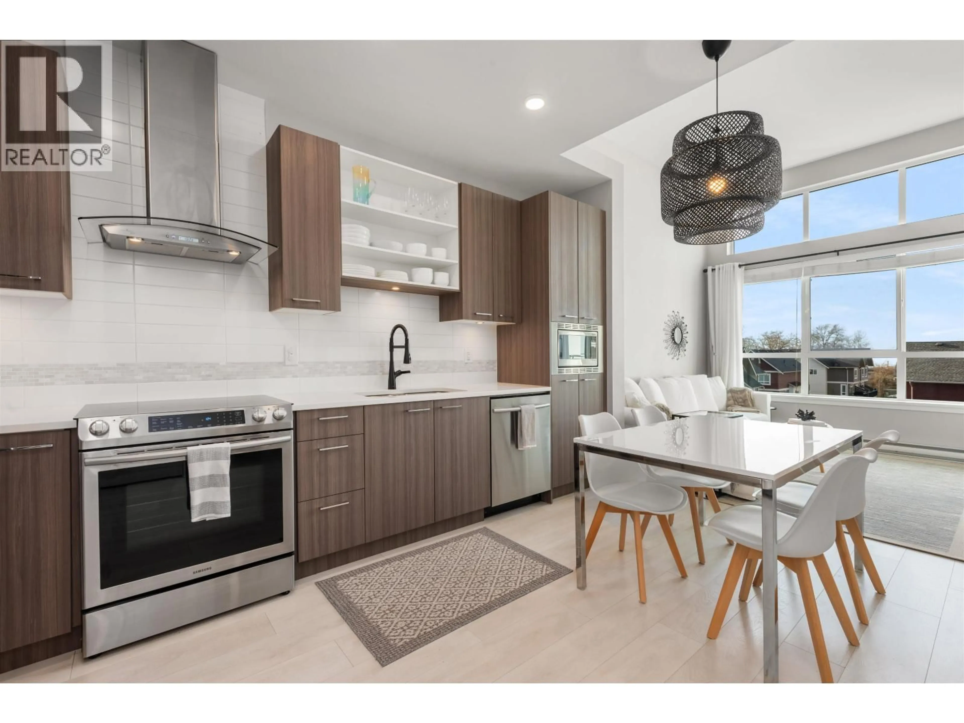 Open concept kitchen, ceramic/tile floor for 408 - 4690 HAWK LANE, Tsawwassen British Columbia V4M0C4