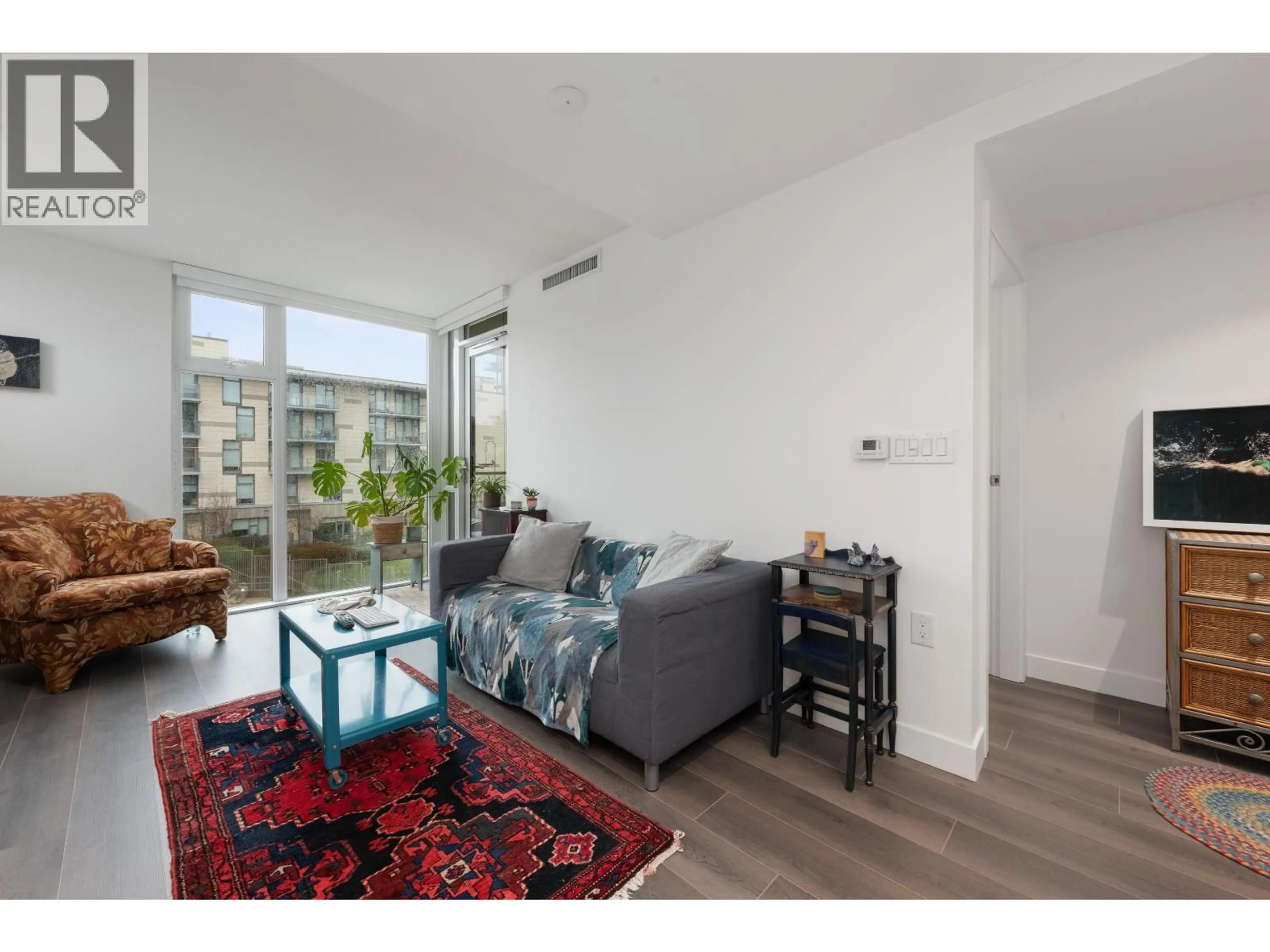 Living room with furniture, unknown for 305 - 8138 FRASER STREET, Vancouver British Columbia V5X0J8