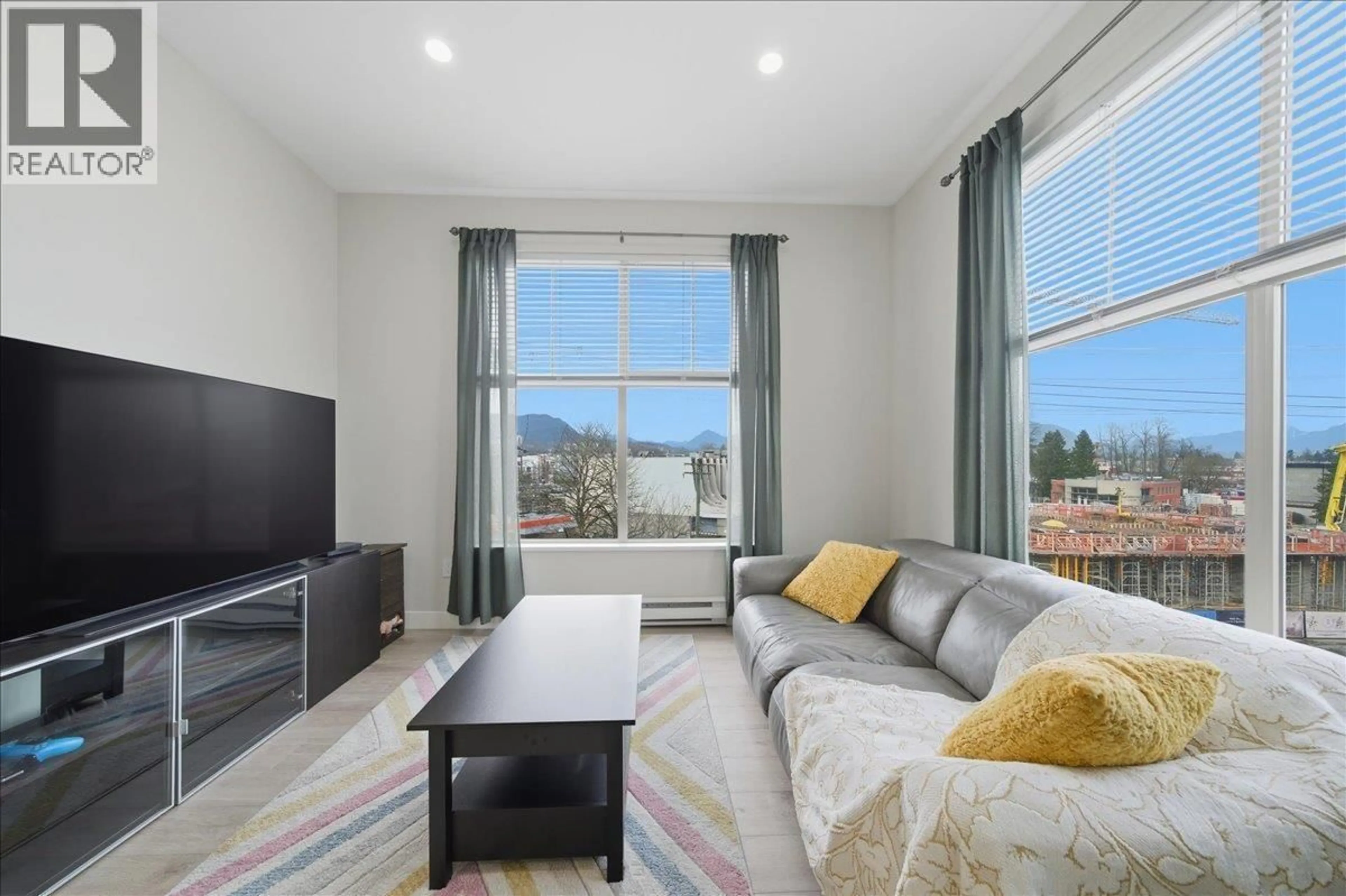 Living room with furniture, unknown for 410 - 2478 SHAUGHNESSY STREET, Port Coquitlam British Columbia V3C0A1