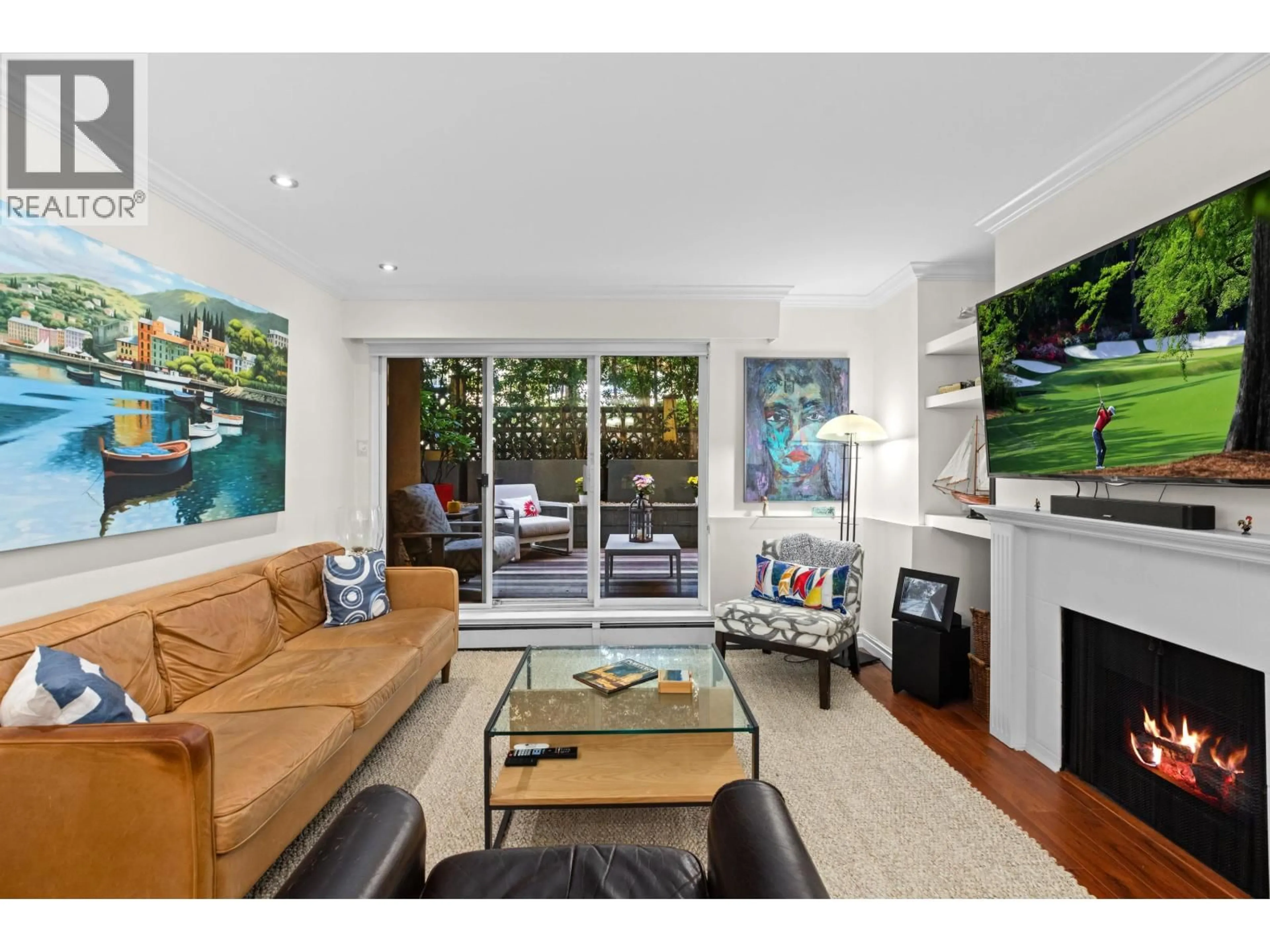 Living room with furniture, wood/laminate floor for 105 - 1125 GILFORD STREET, Vancouver British Columbia V6G2P7