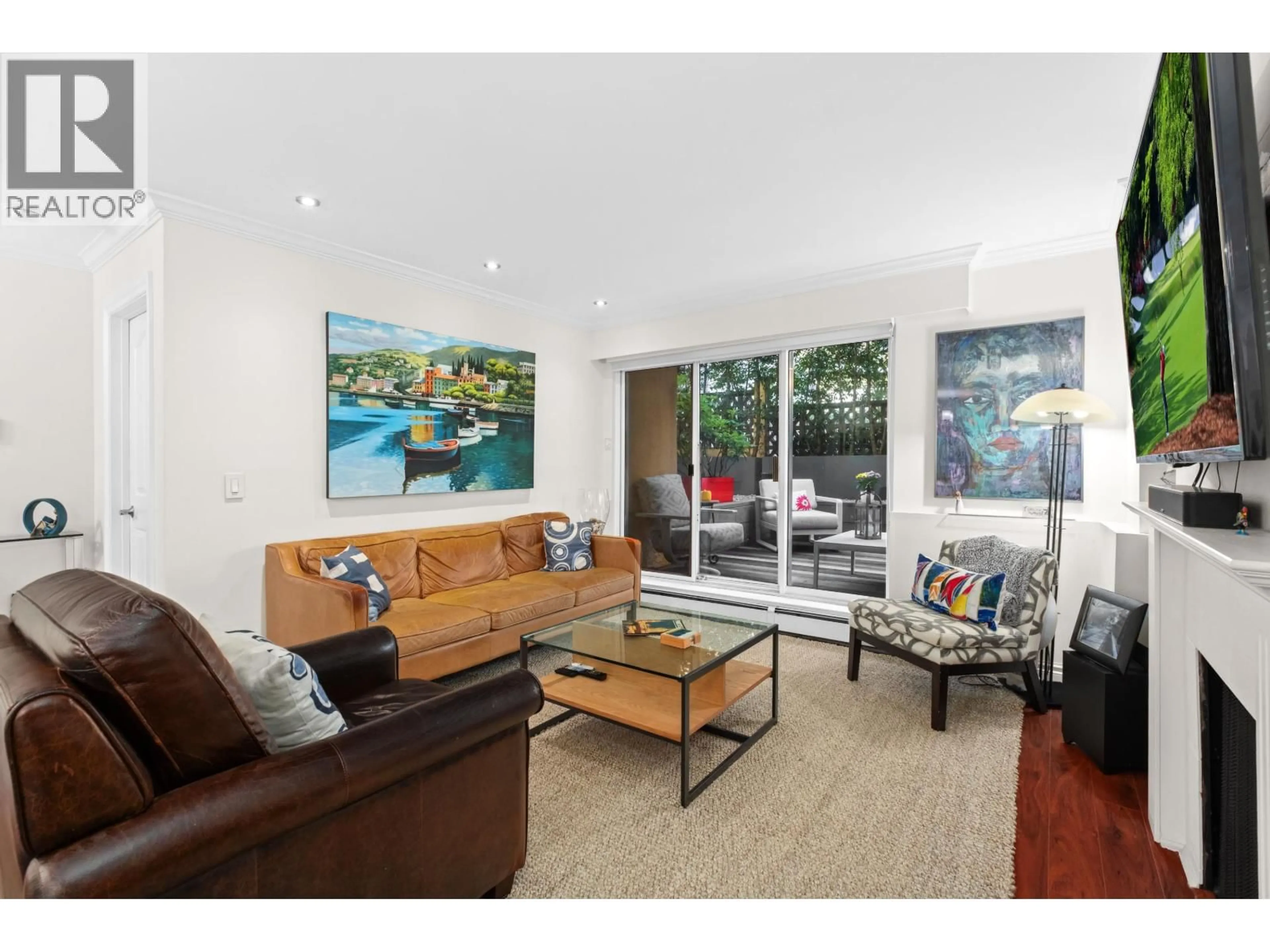 Living room with furniture, wood/laminate floor for 105 - 1125 GILFORD STREET, Vancouver British Columbia V6G2P7