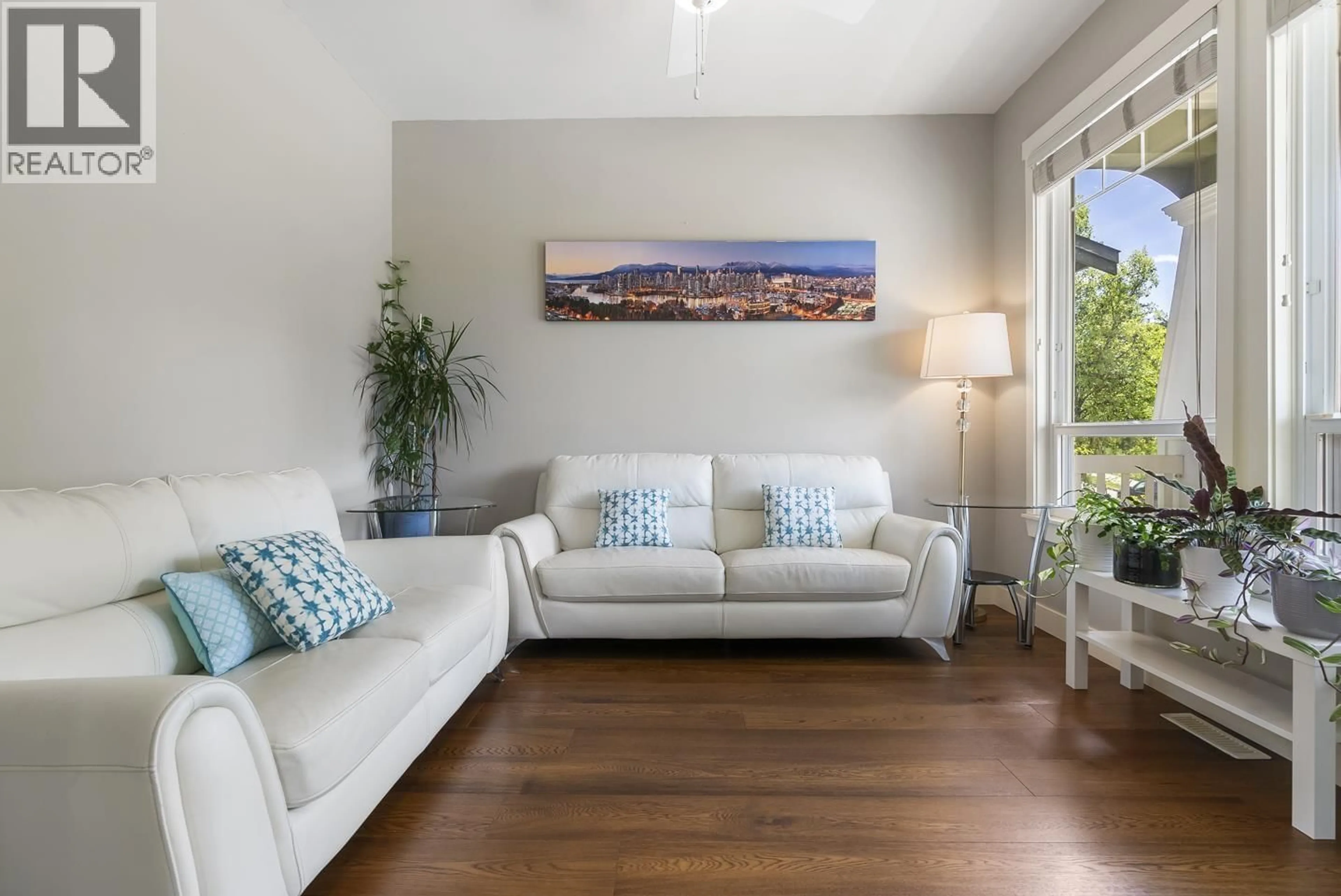 Living room with furniture, wood/laminate floor for 23359 KANAKA WAY, Maple Ridge British Columbia V2W0B7