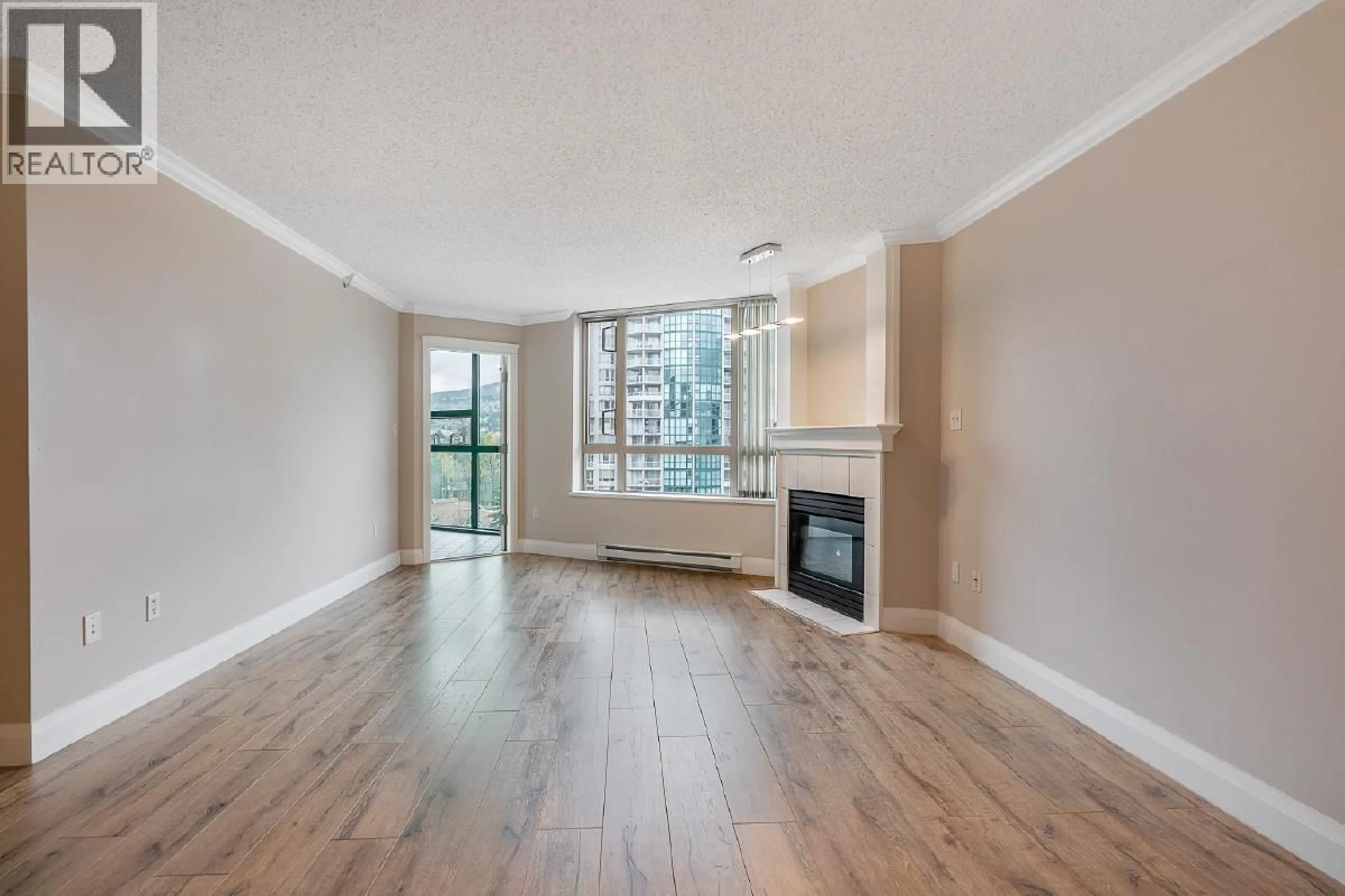 Living room with furniture, wood/laminate floor for 1305 - 1190 PIPELINE ROAD, Coquitlam British Columbia V3B7T9