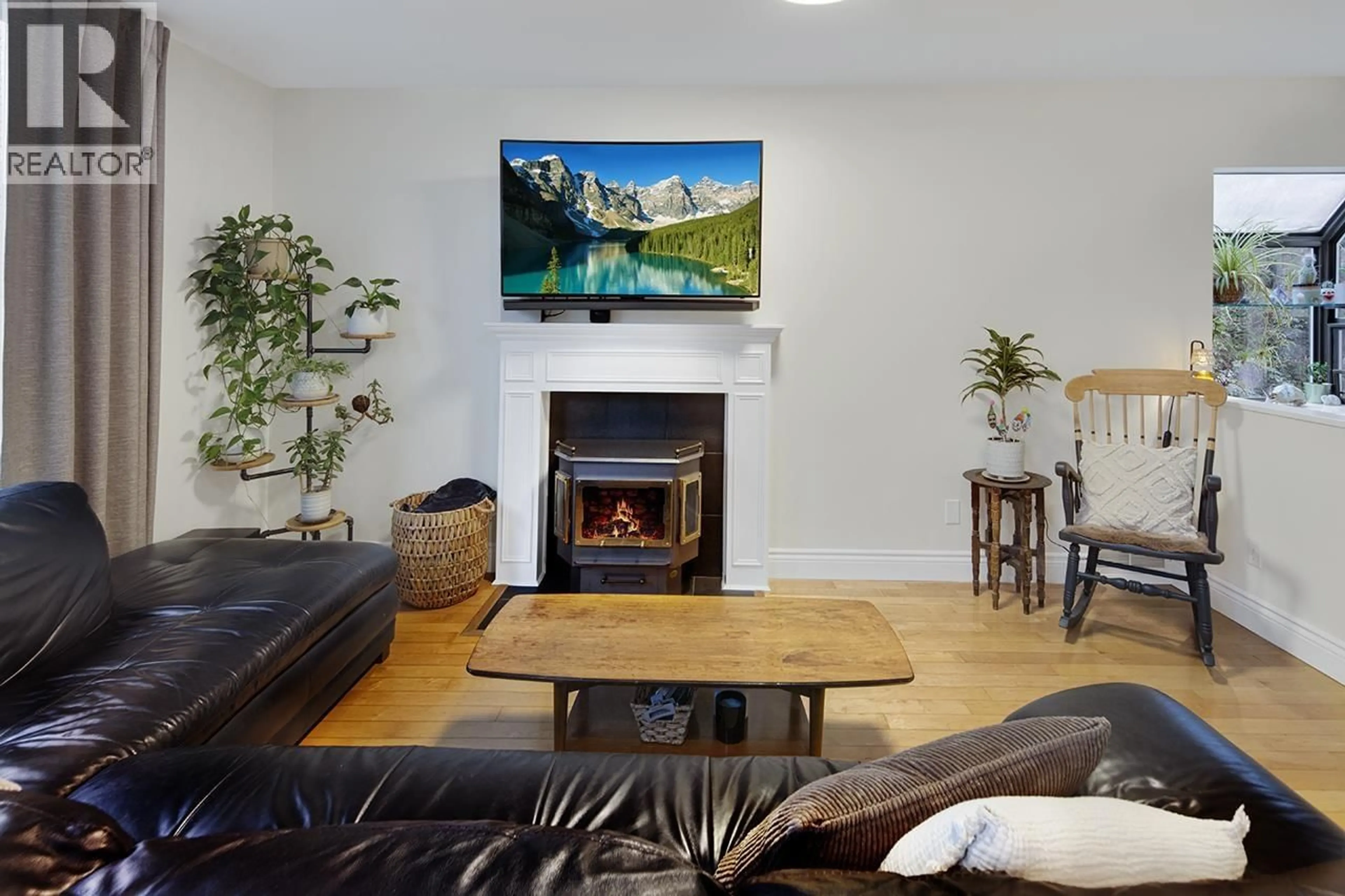 Living room with furniture, wood/laminate floor for 1736 LANGAN AVENUE, Port Coquitlam British Columbia V3C1K7