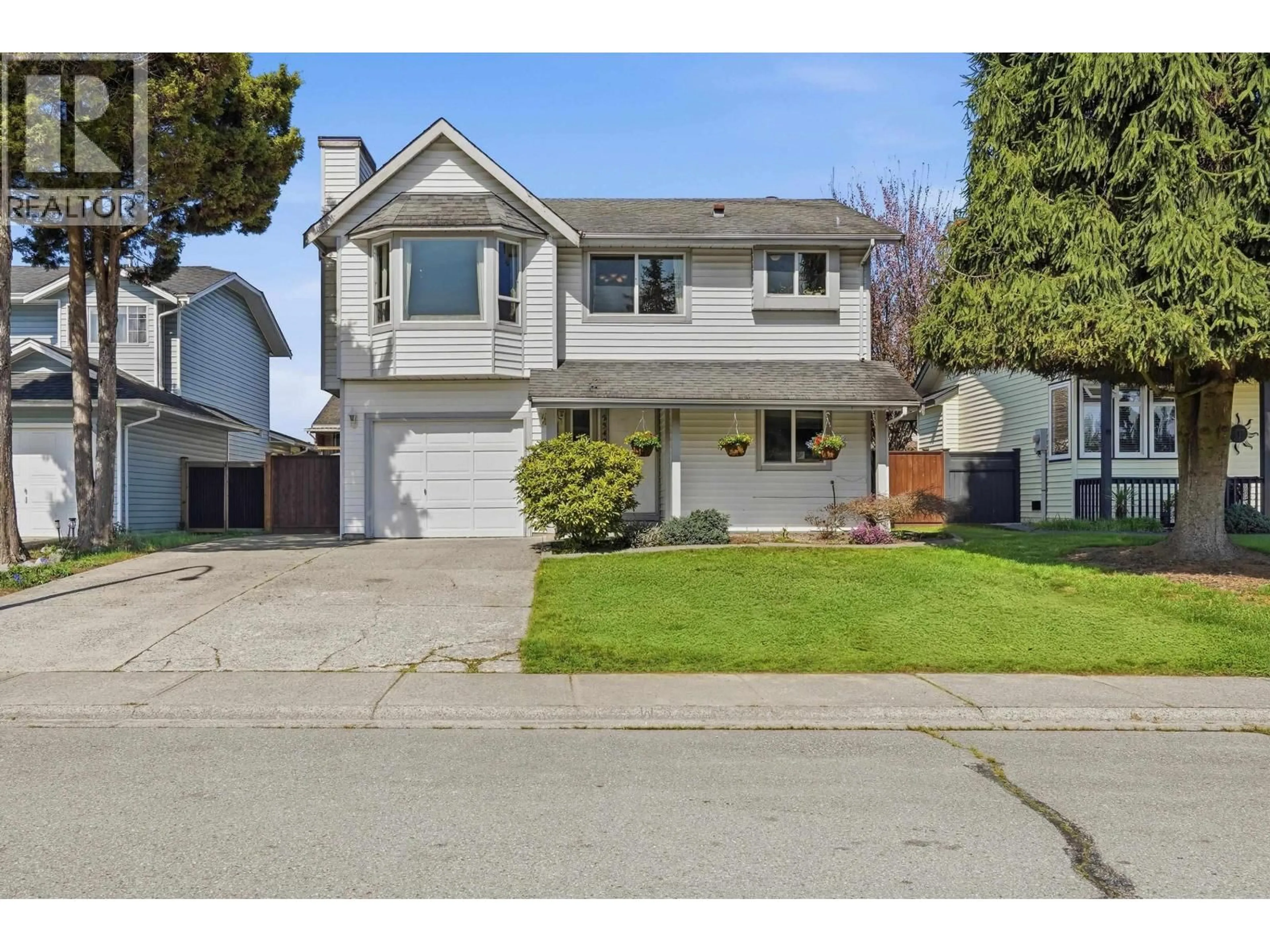 Home with vinyl exterior material, street for 23429 SANDPIPER AVENUE, Maple Ridge British Columbia V2X9M4