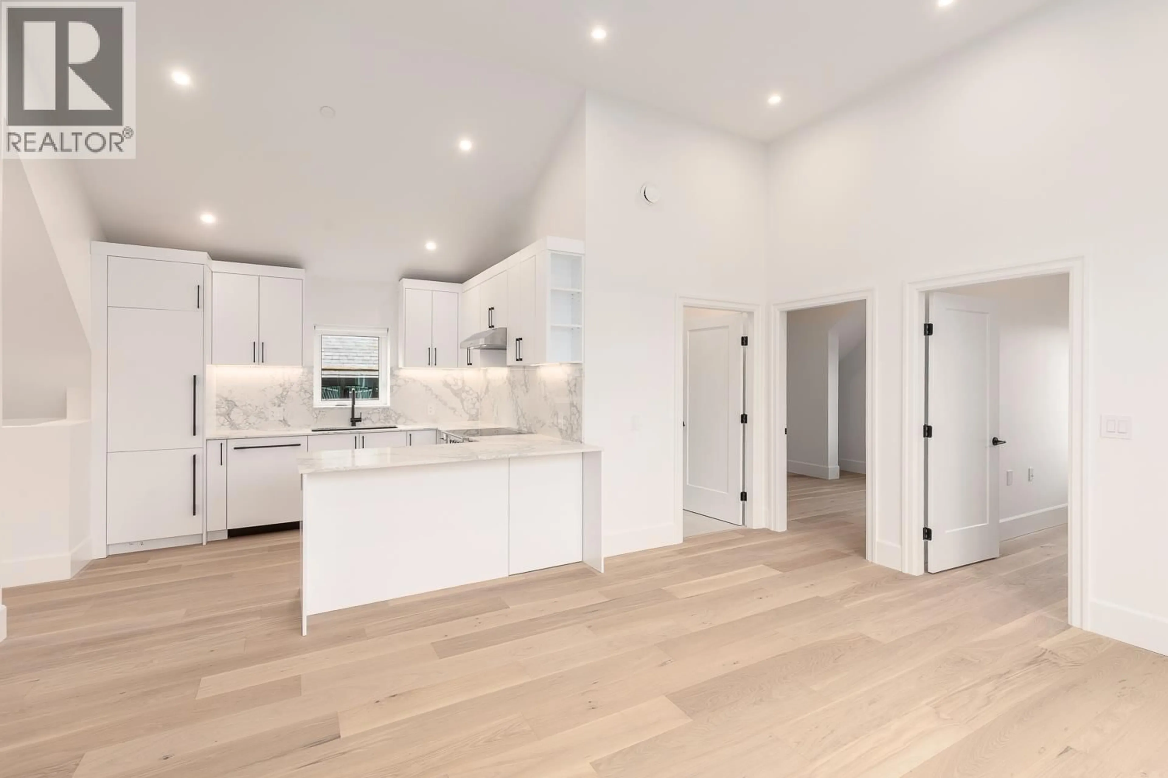 Open concept kitchen, wood/laminate floor for 849 19TH AVENUE, Vancouver British Columbia V5V1K6