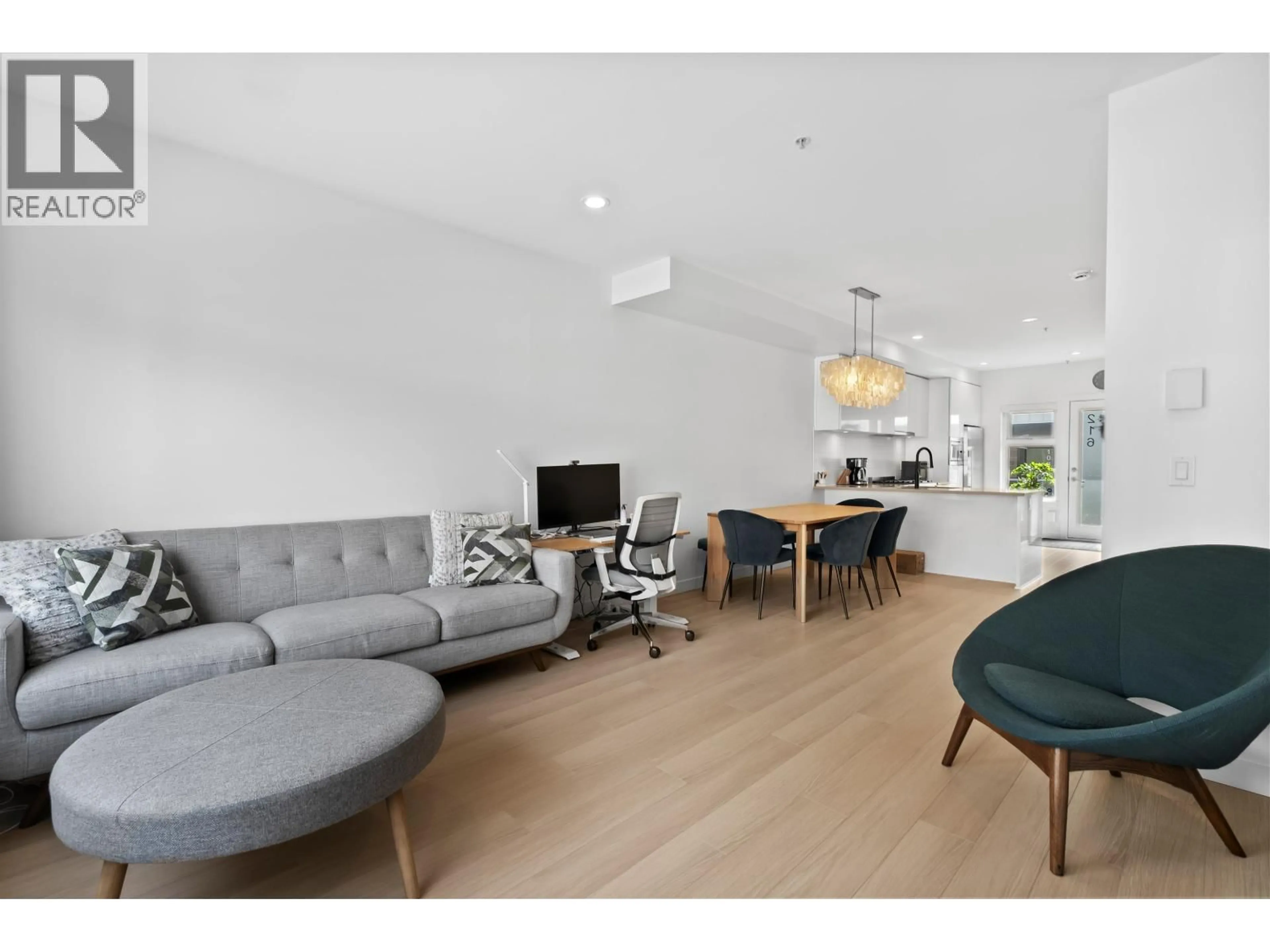 Living room with furniture, wood/laminate floor for 216 - 455 16TH AVENUE, Vancouver British Columbia V5T2T8