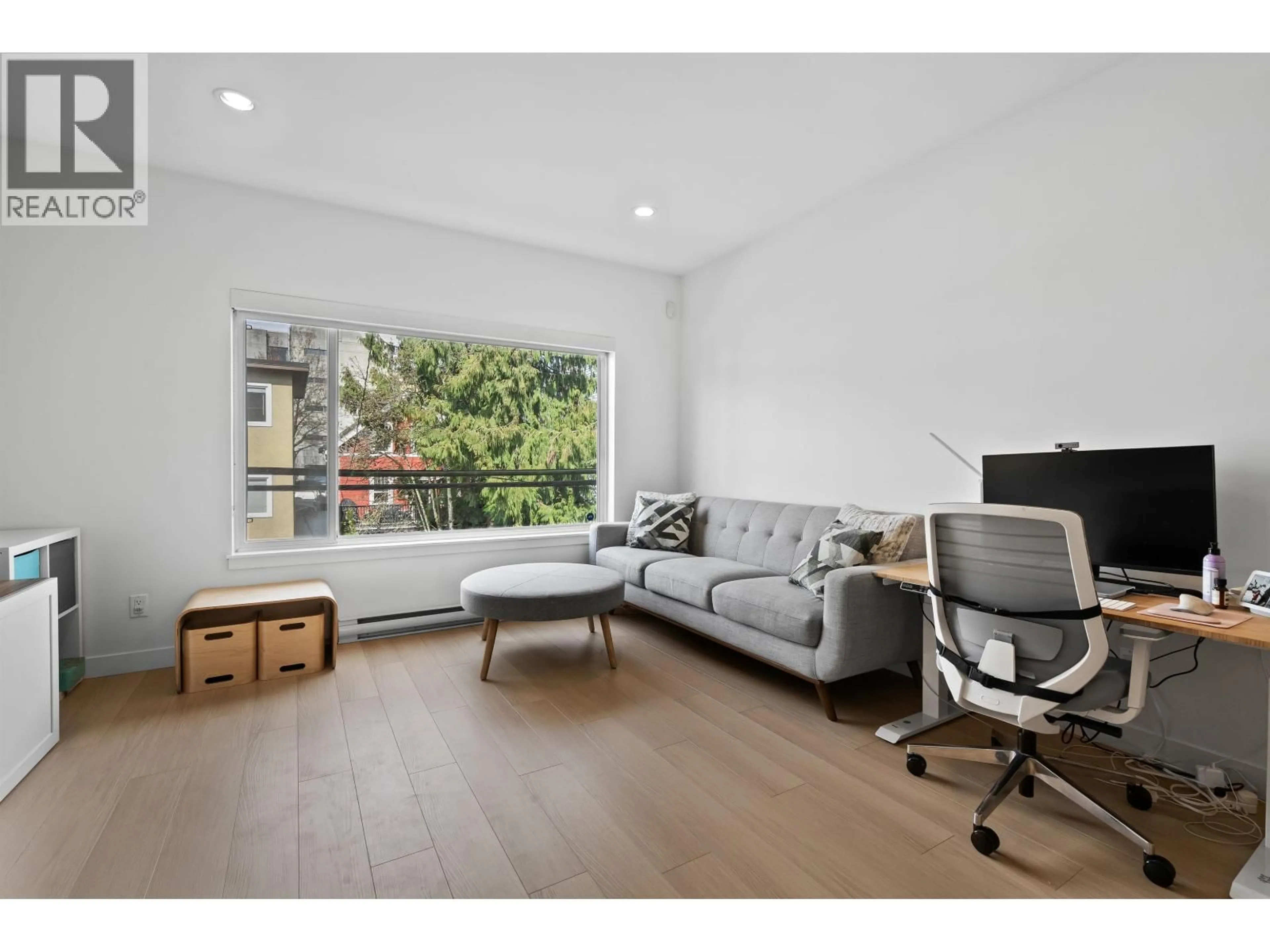 Living room with furniture, wood/laminate floor for 216 - 455 16TH AVENUE, Vancouver British Columbia V5T2T8