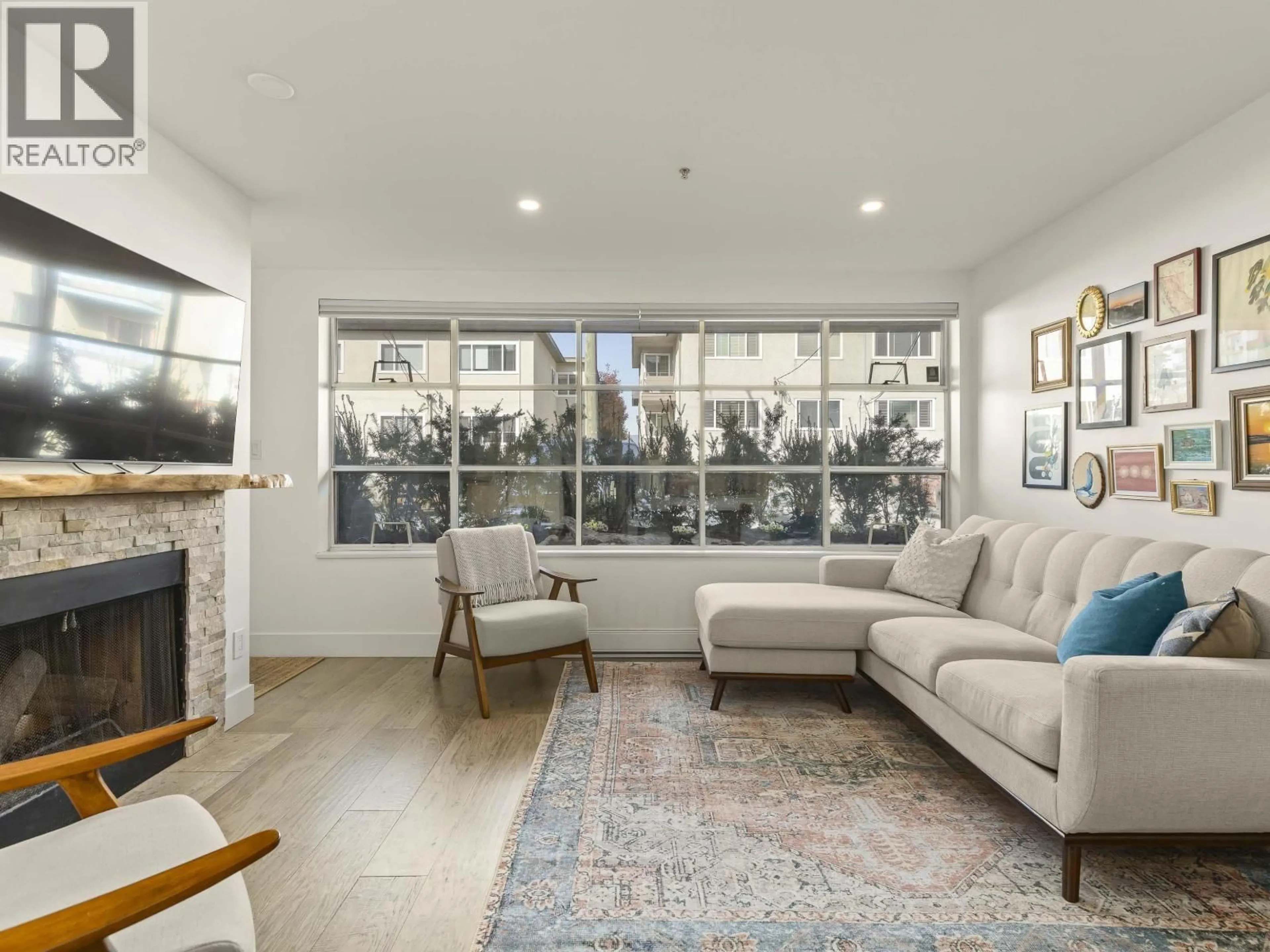 Living room with furniture, unknown for 102 - 2287 3RD AVENUE, Vancouver British Columbia V6K1L5