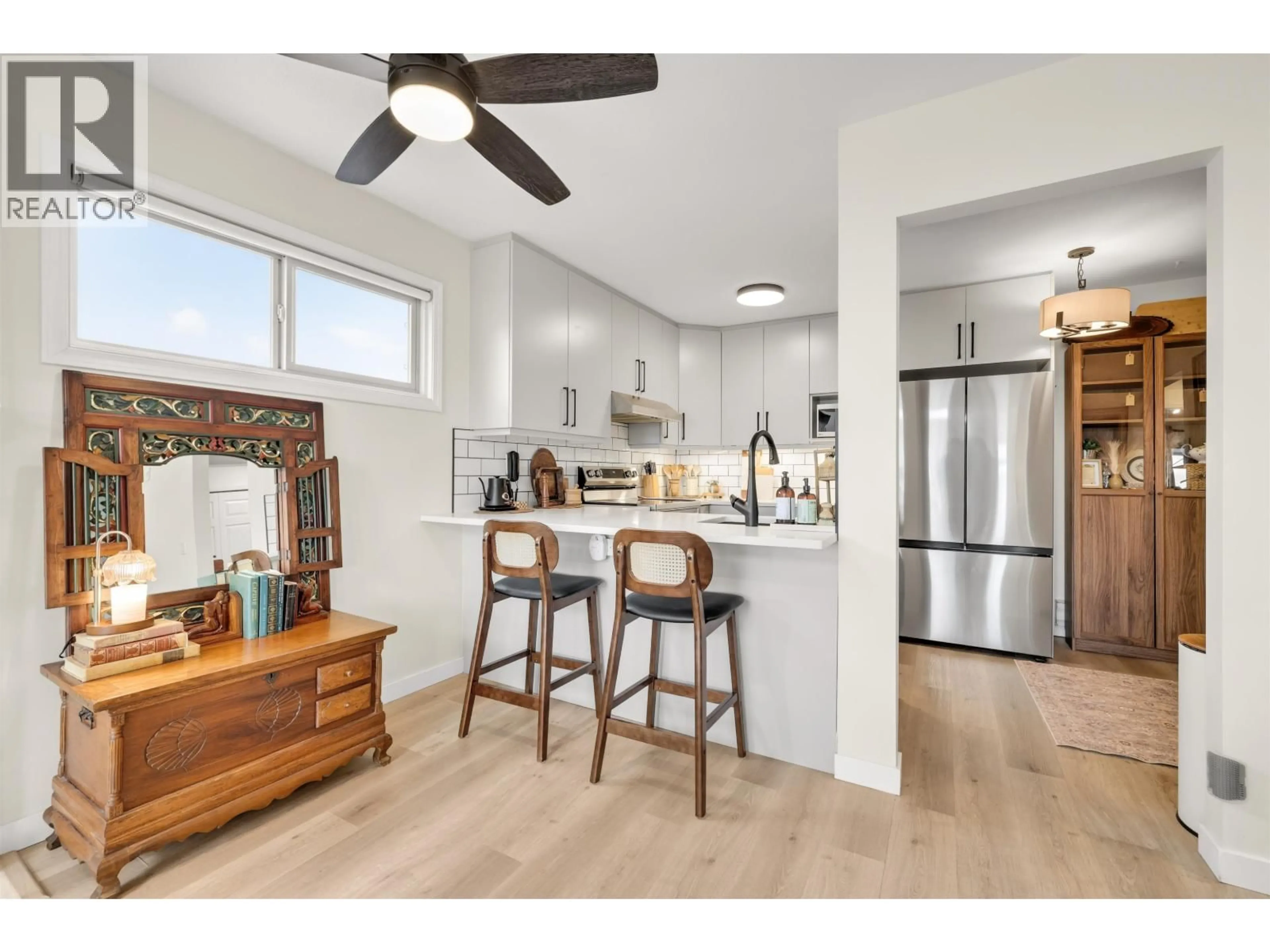 Open concept kitchen, wood/laminate floor for D302 - 4845 53 STREET, Delta British Columbia V4K2Z3