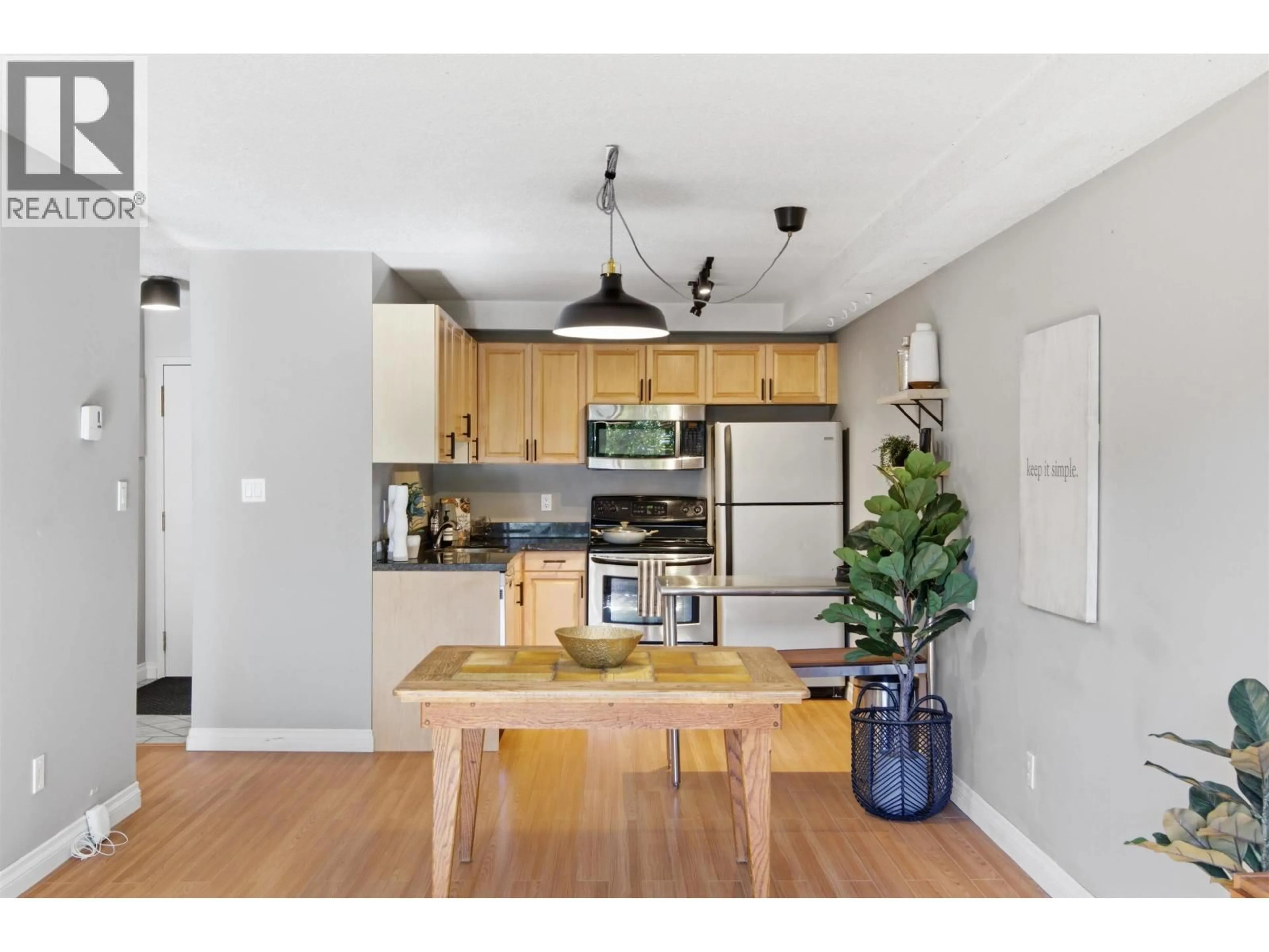 Open concept kitchen, wood/laminate floor for 108 - 251 4TH STREET, North Vancouver British Columbia V7M1H8