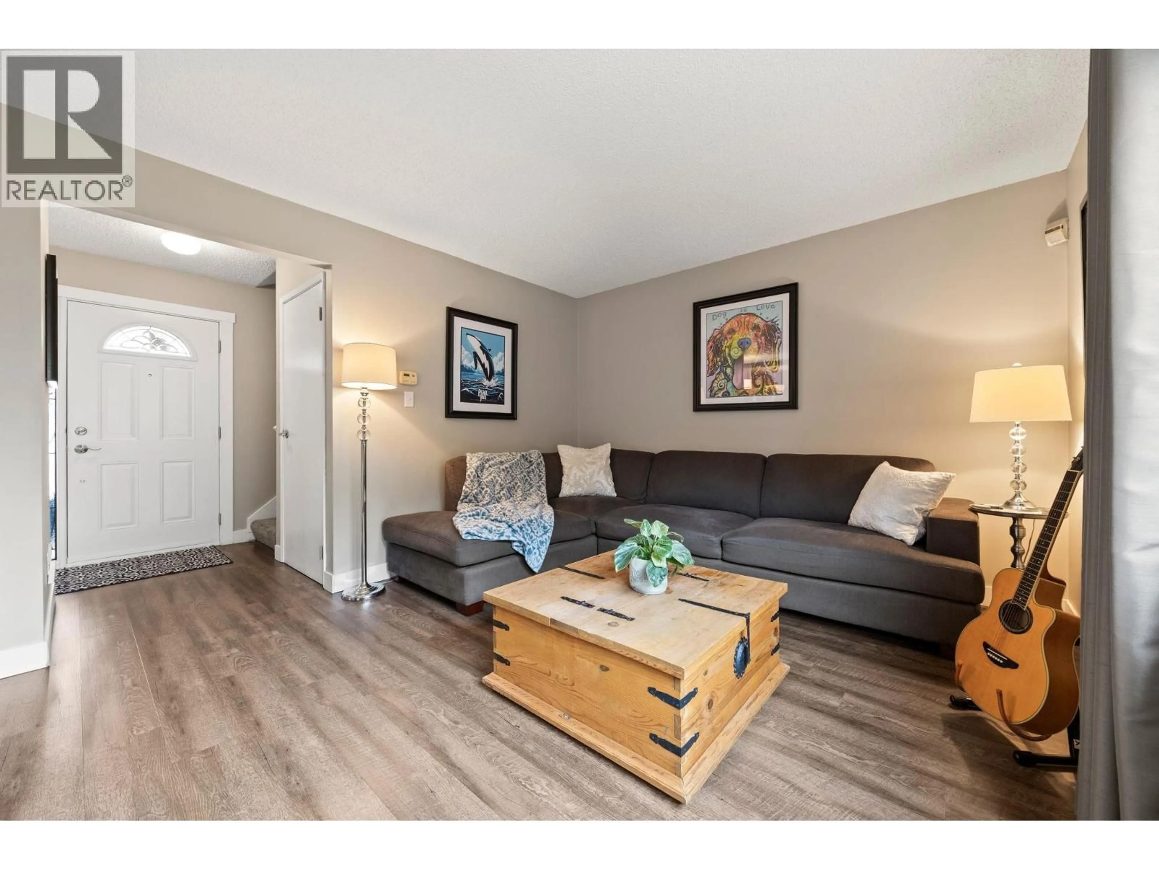 Living room with furniture, wood/laminate floor for 63 - 2905 NORMAN AVENUE, Coquitlam British Columbia V3C4H8