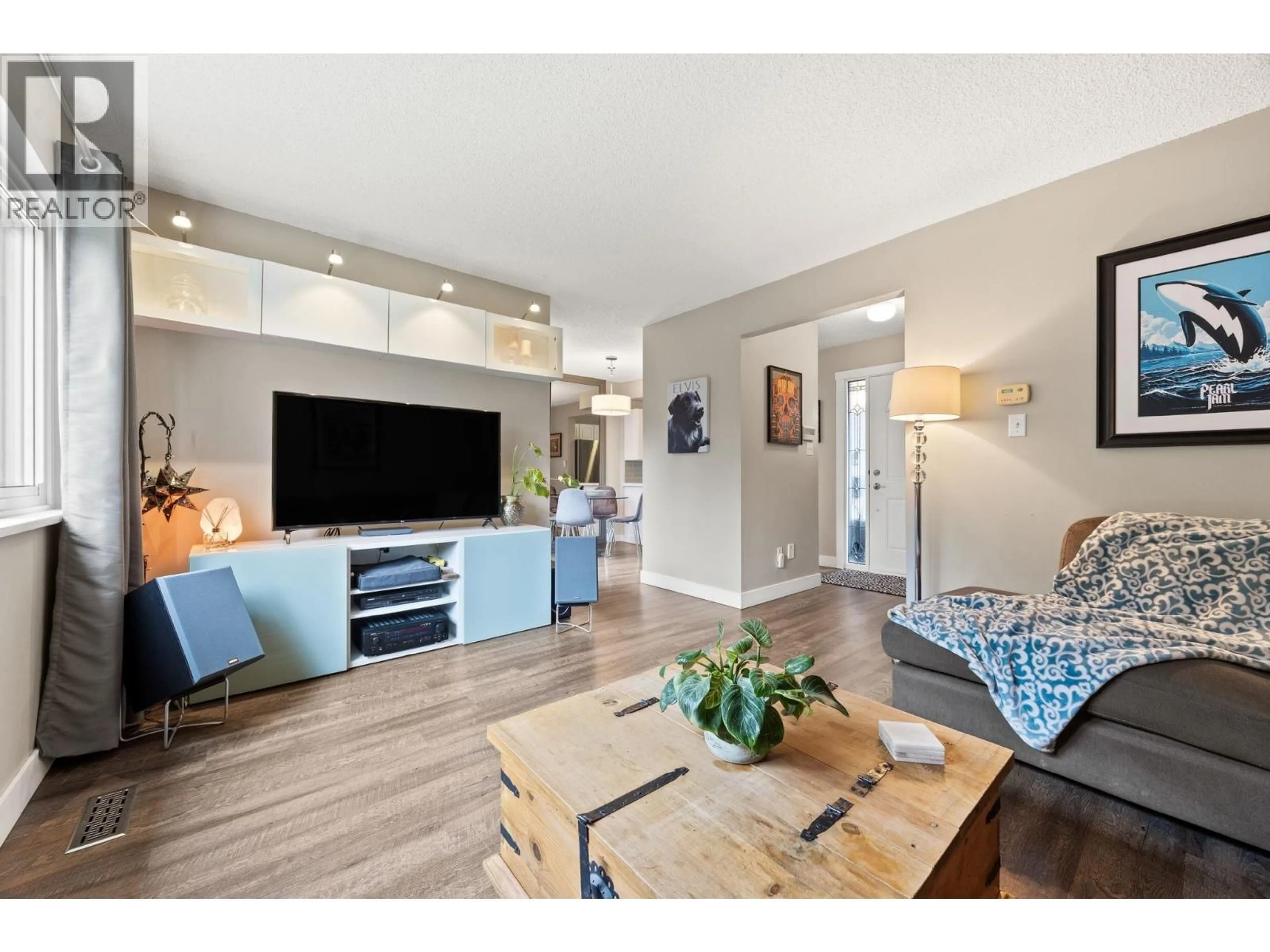 Living room with furniture, wood/laminate floor for 63 - 2905 NORMAN AVENUE, Coquitlam British Columbia V3C4H8