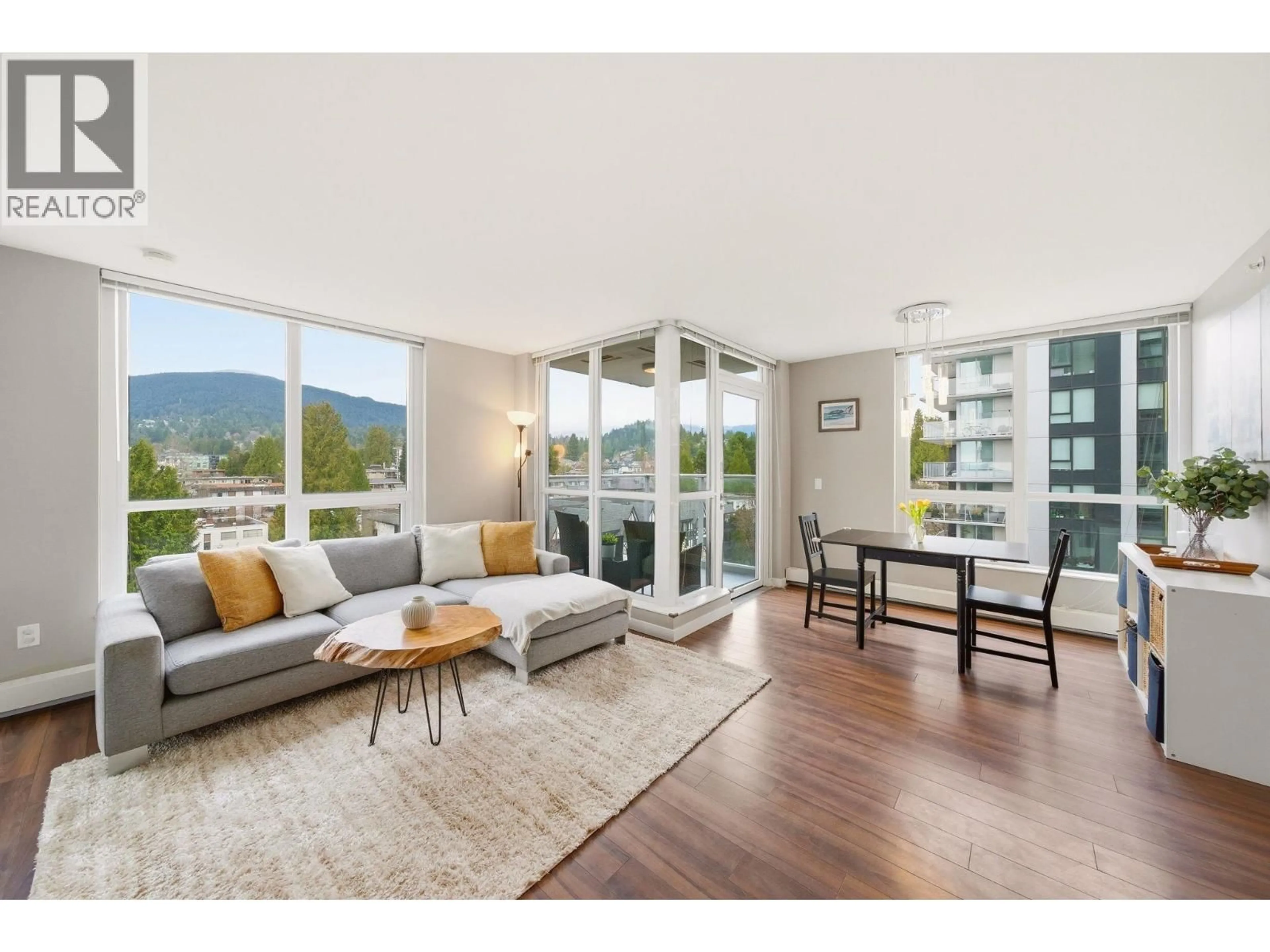 Living room with furniture, wood/laminate floor for 705 - 135 17TH STREET, North Vancouver British Columbia V7L0C4