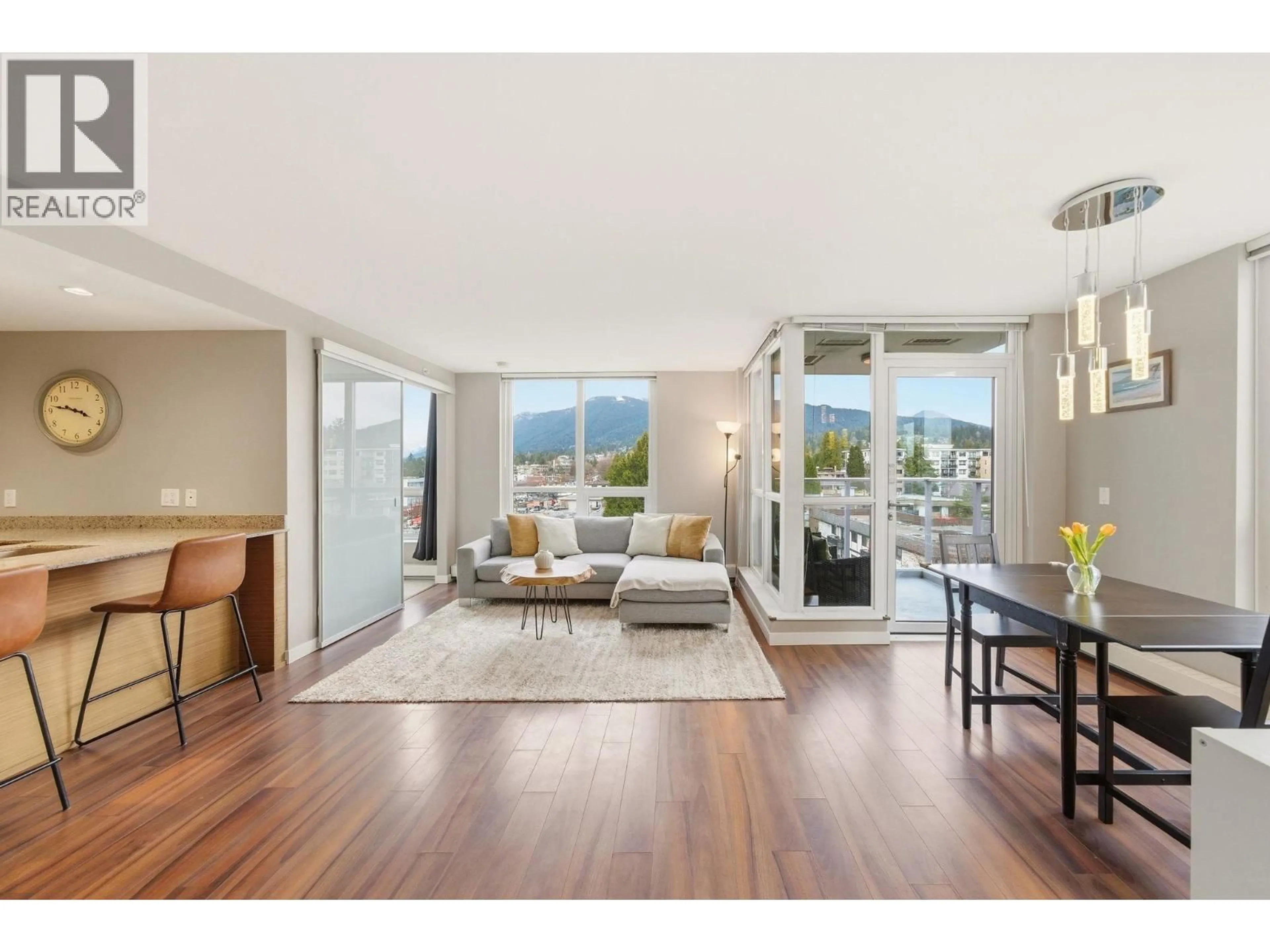 Living room with furniture, wood/laminate floor for 705 - 135 17TH STREET, North Vancouver British Columbia V7L0C4