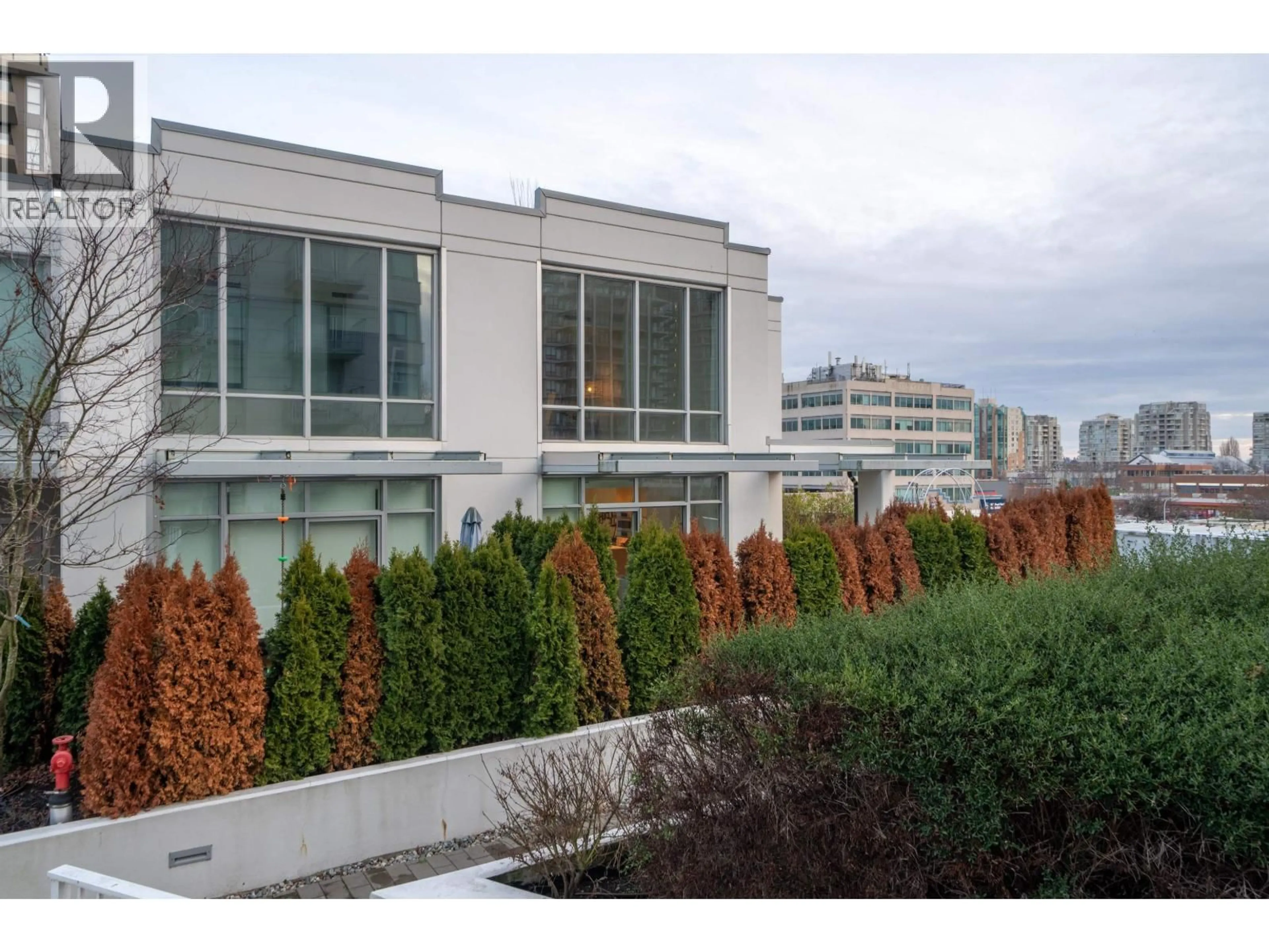 Patio, city buildings view from balcony for 319 - 5580 NO. 3 ROAD, Richmond British Columbia V6X0R8
