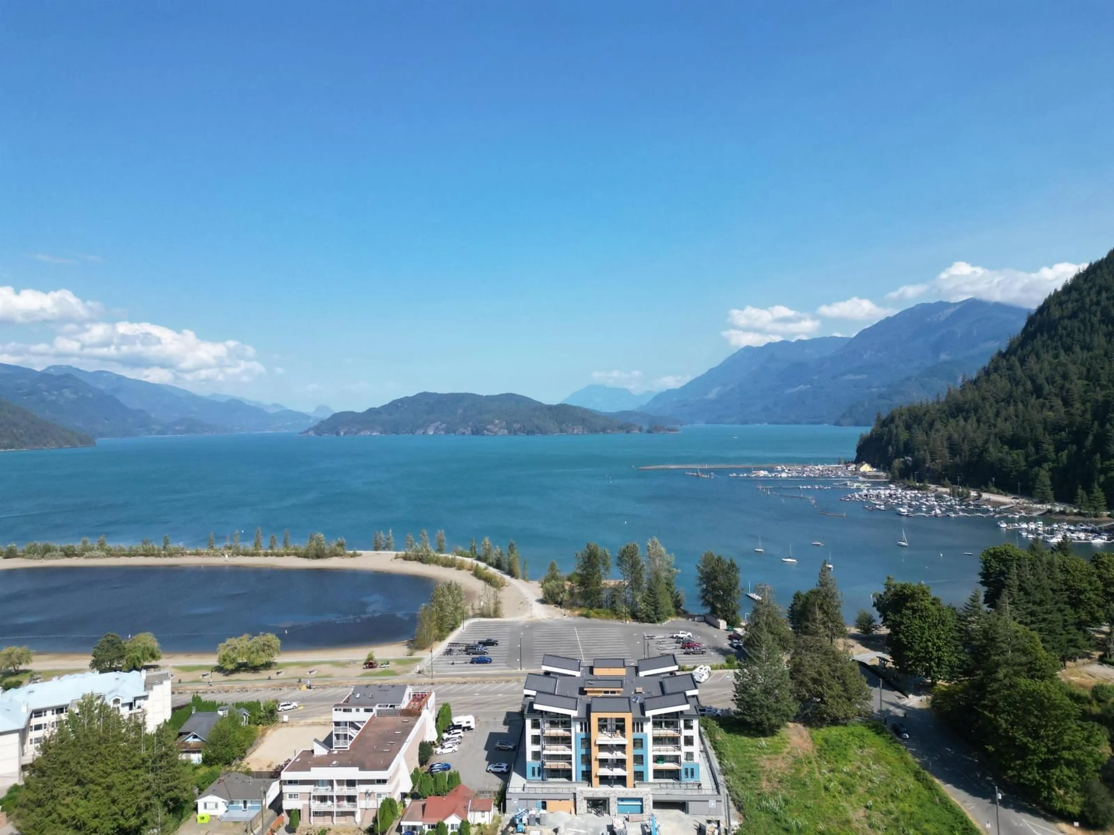 A pic from outside/outdoor area/front of a property/back of a property/a pic from drone, water/lake/river/ocean view for 106 - 470 ESPLANADE AVENUE, Harrison Hot Springs British Columbia V0M1K0