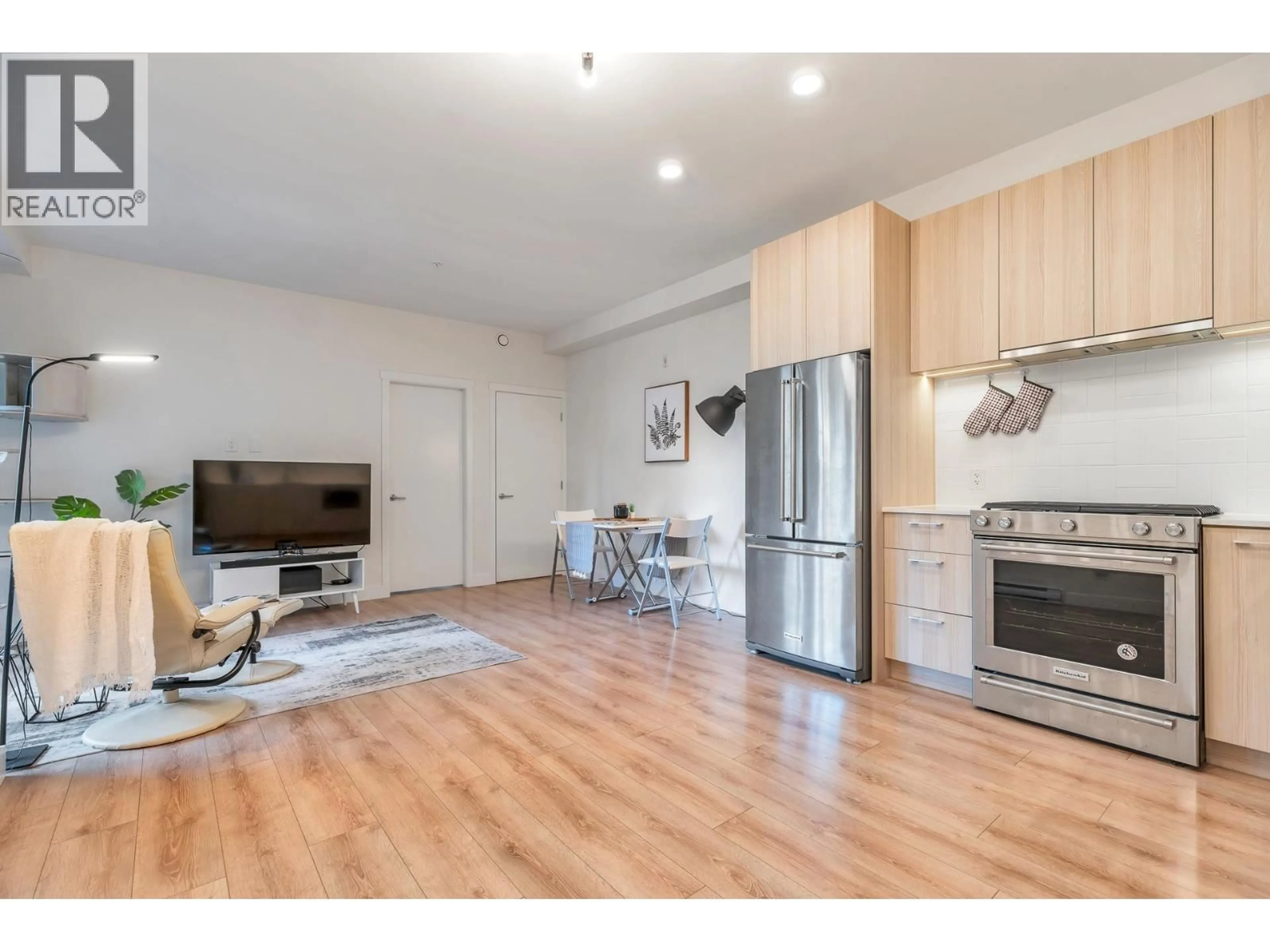 Open concept kitchen, wood/laminate floor for 201 - 721 ANSKAR COURT, Coquitlam British Columbia V3J0L4