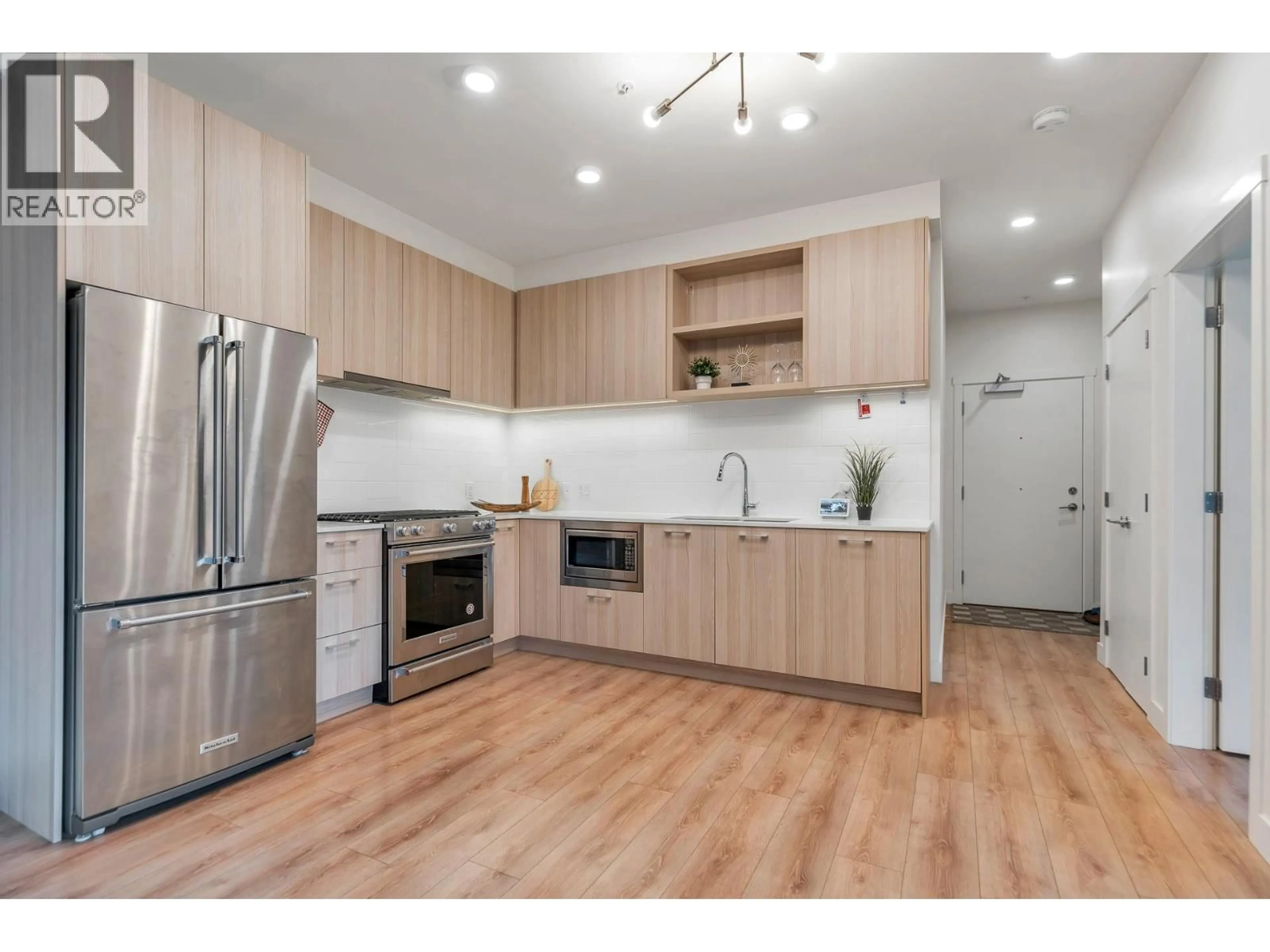 Open concept kitchen, wood/laminate floor for 201 - 721 ANSKAR COURT, Coquitlam British Columbia V3J0L4