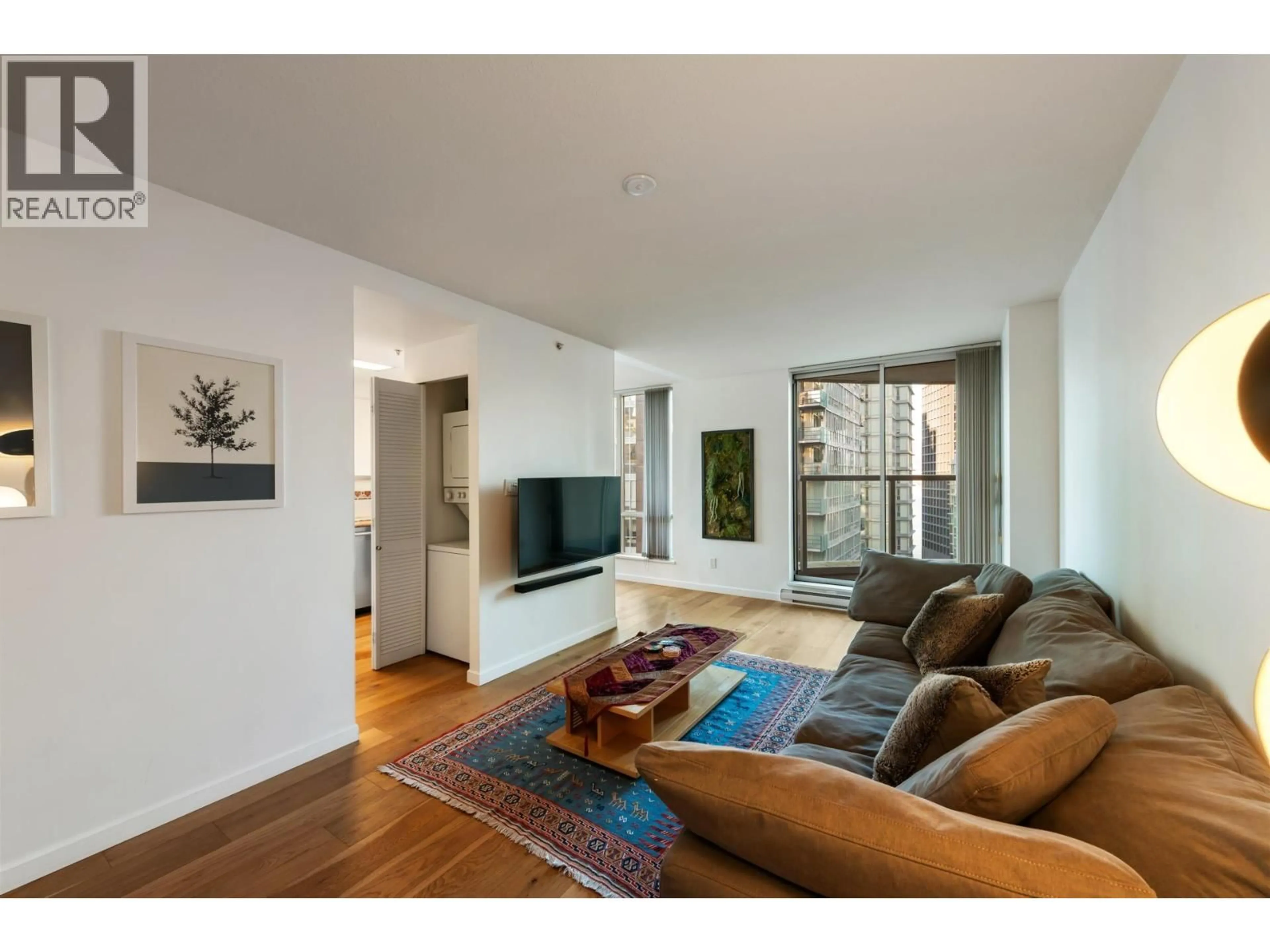 Living room with furniture, unknown for 2103 - 1166 MELVILLE STREET, Vancouver British Columbia V6E4P5