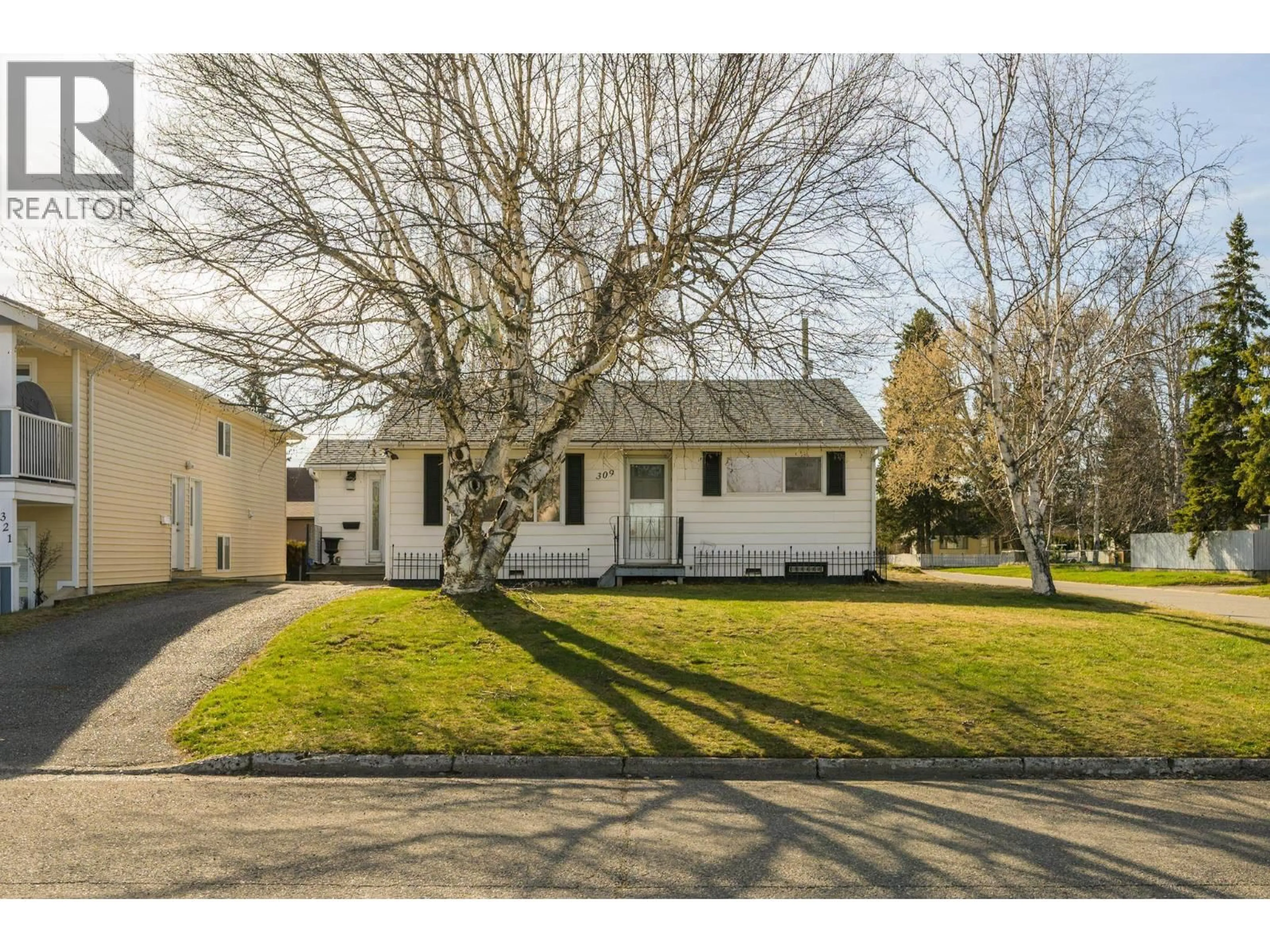Home with vinyl exterior material, street for 309 WAINWRIGHT STREET, Prince George British Columbia V2M2C3