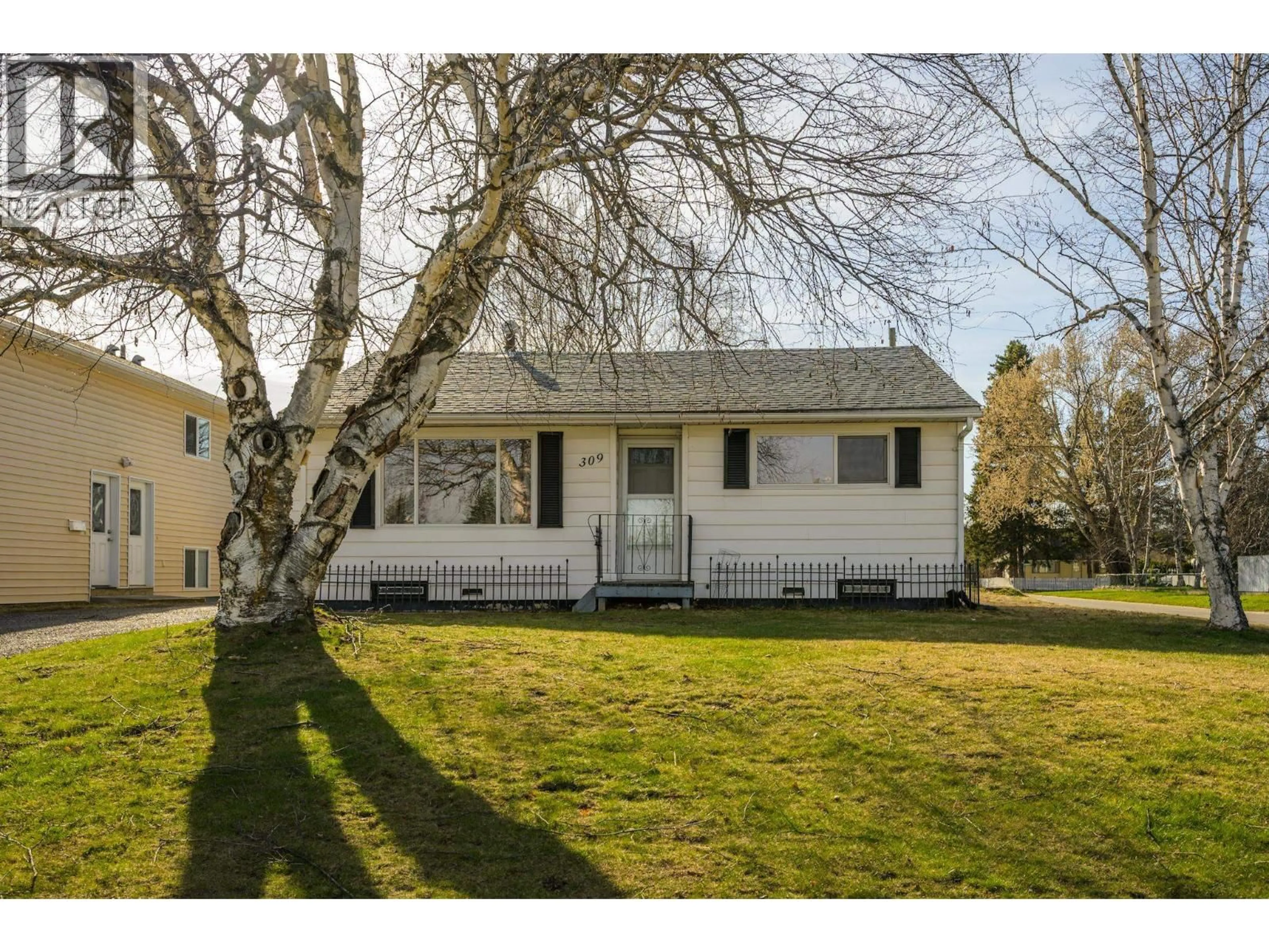 Home with vinyl exterior material, street for 309 WAINWRIGHT STREET, Prince George British Columbia V2M2C3