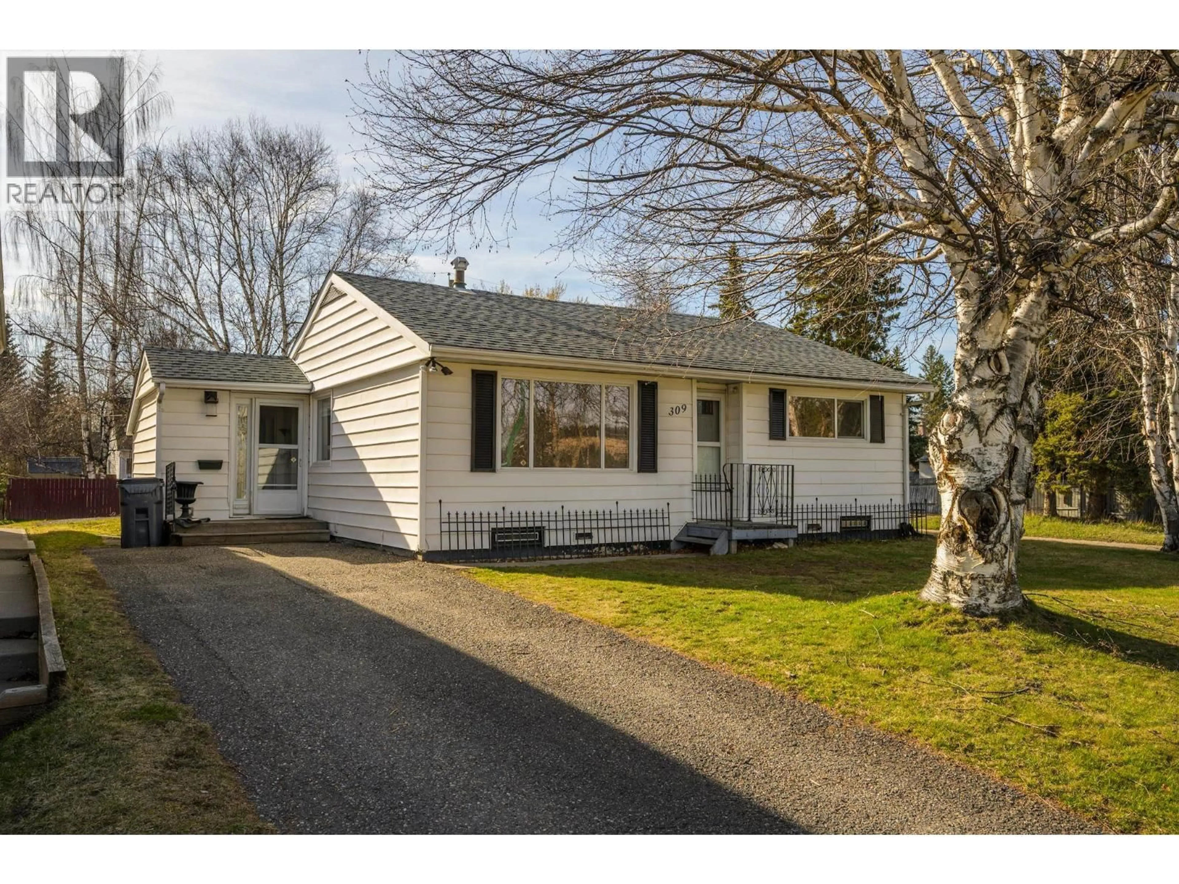 Home with vinyl exterior material, street for 309 WAINWRIGHT STREET, Prince George British Columbia V2M2C3