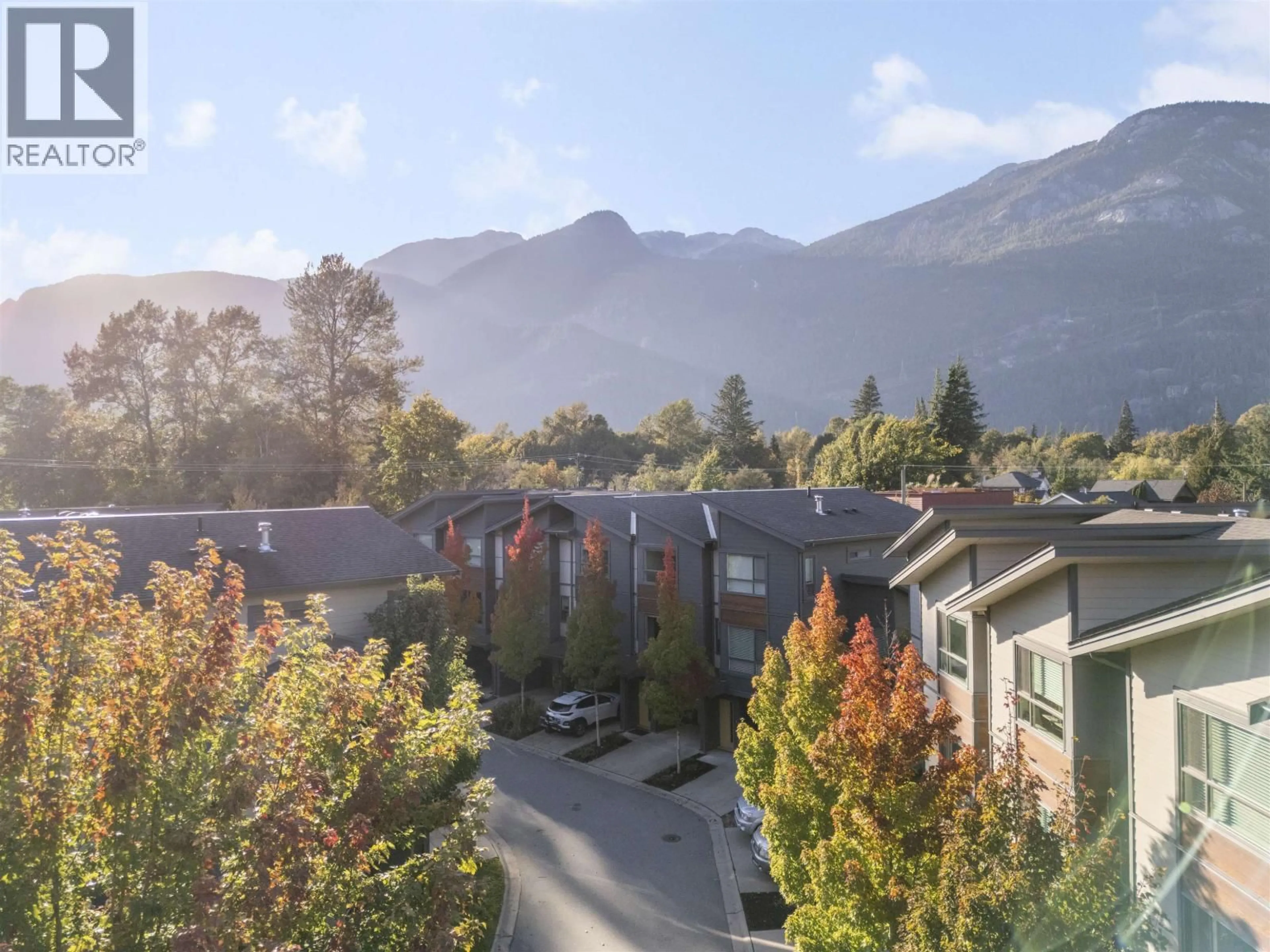 A pic from outside/outdoor area/front of a property/back of a property/a pic from drone, mountain view for 34 - 38684 BUCKLEY AVENUE, Squamish British Columbia V8B0A9