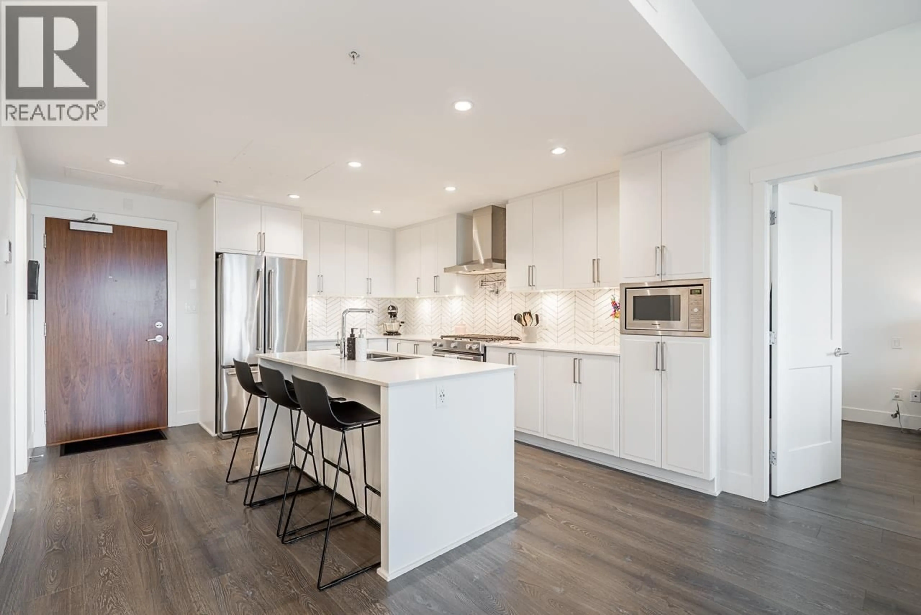 Open concept kitchen, unknown for 506 - 4477 HASTINGS STREET, Burnaby British Columbia V5C0L6