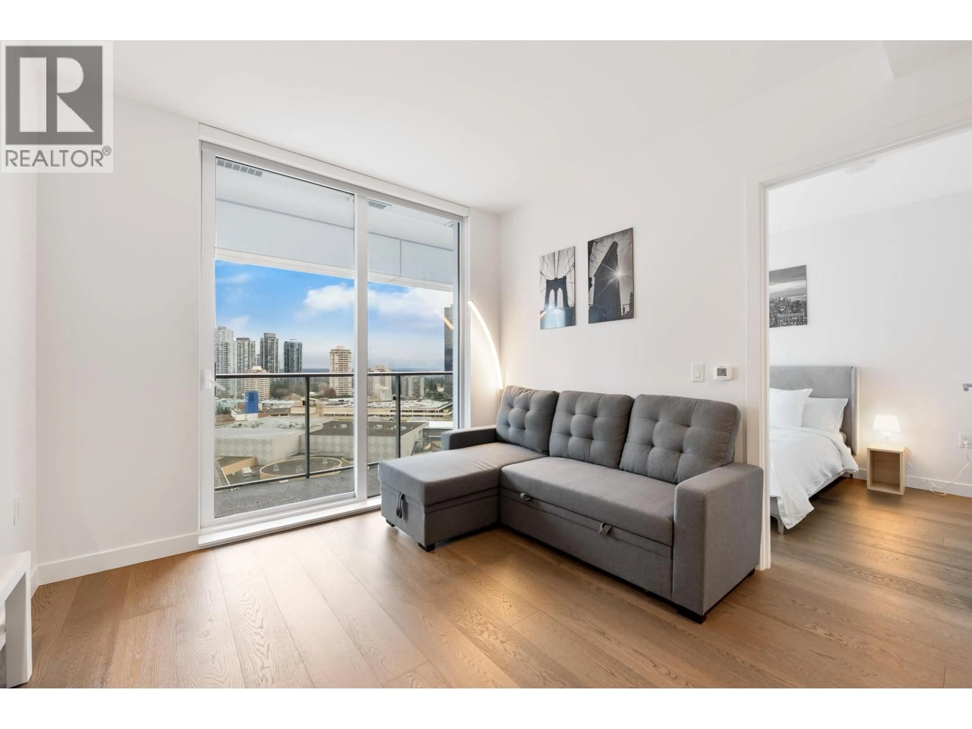 Living room with furniture, wood/laminate floor for 1801 - 6000 MCKAY AVENUE, Burnaby British Columbia V5H0K2