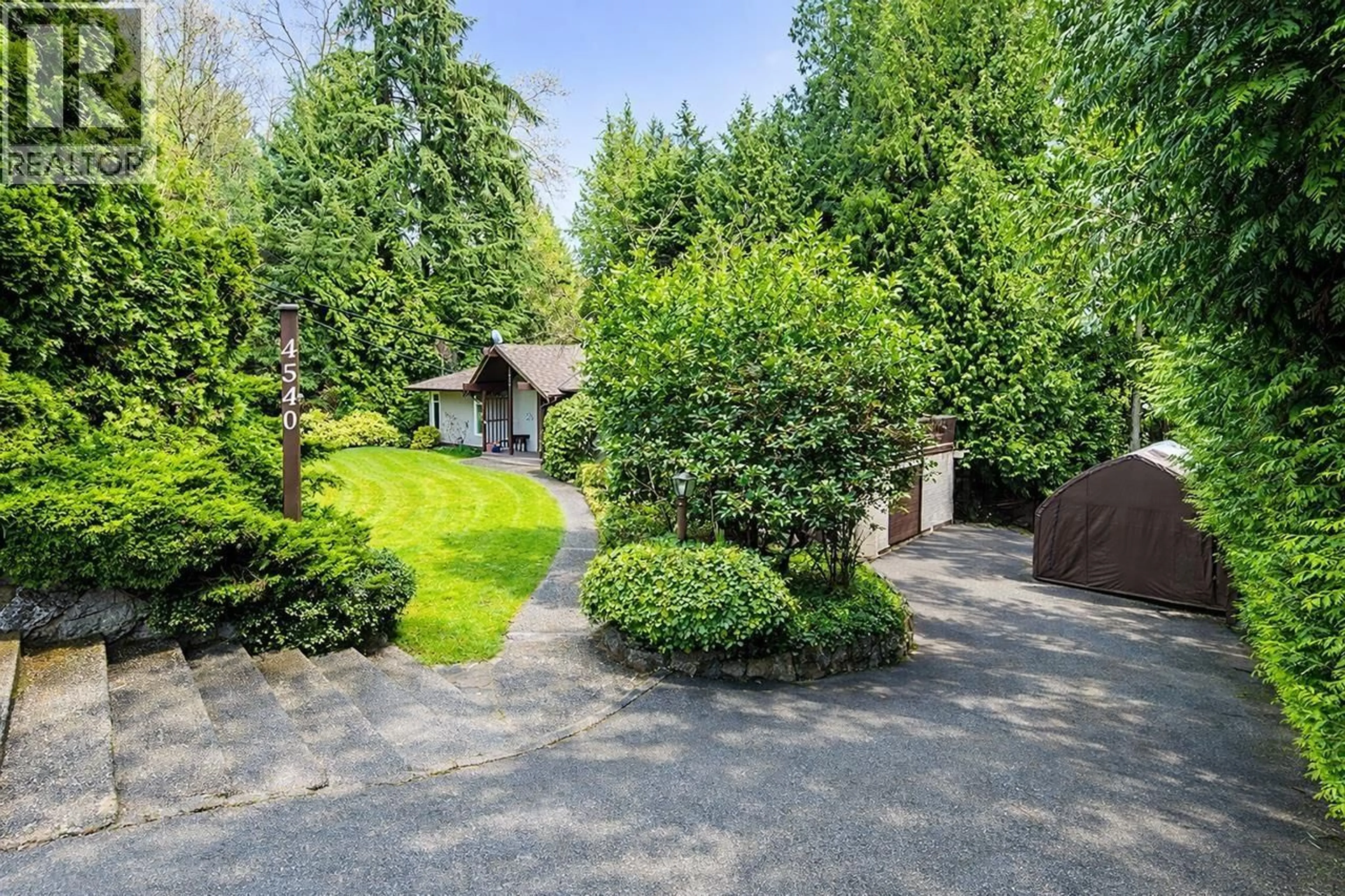 A pic from outside/outdoor area/front of a property/back of a property/a pic from drone, street for 4540 MOUNTAIN HIGHWAY, North Vancouver British Columbia V7K2K6