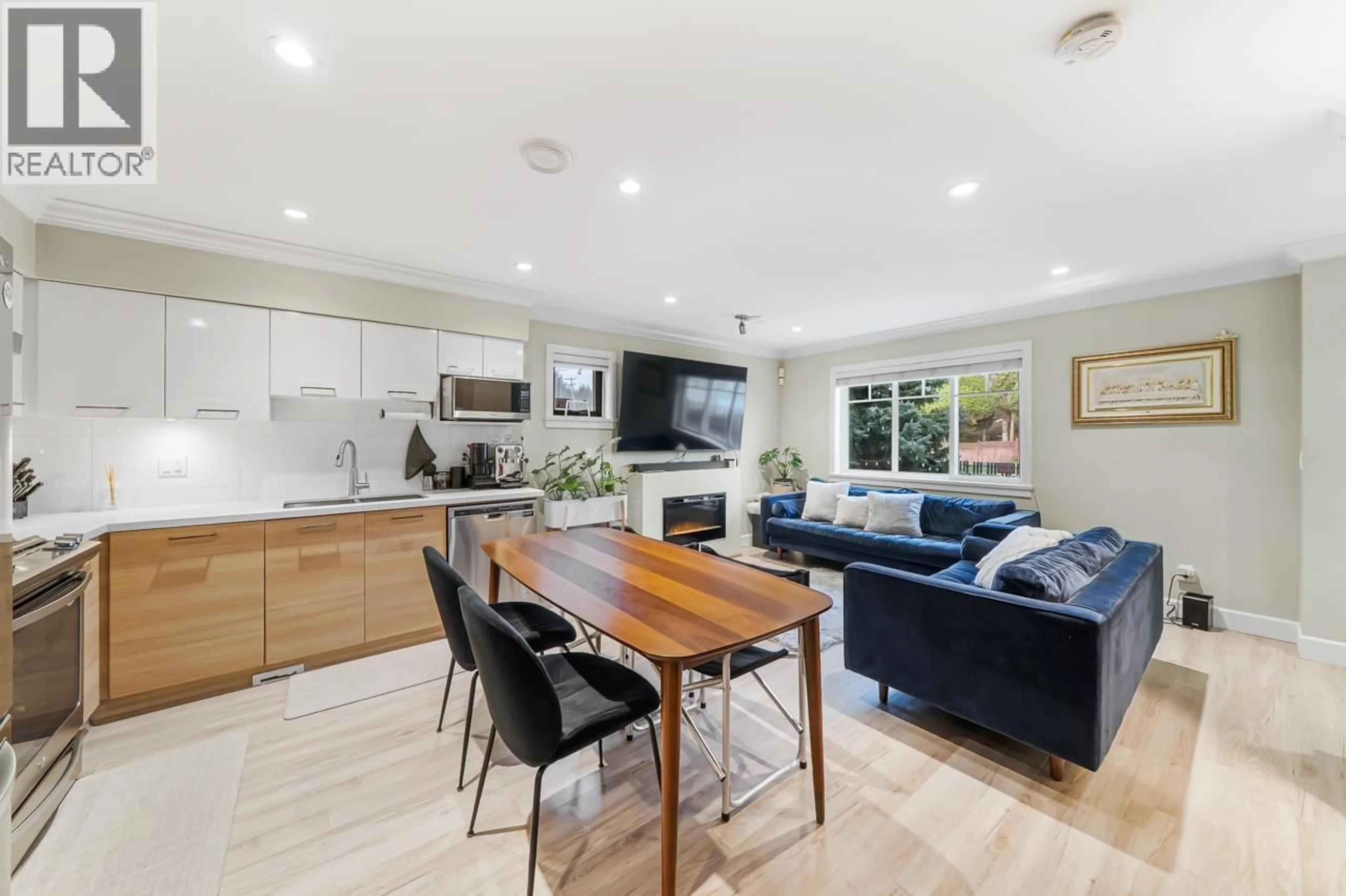 Open concept kitchen, wood/laminate floor for 3 - 6511 NO. 2 ROAD, Richmond British Columbia V7C3L4