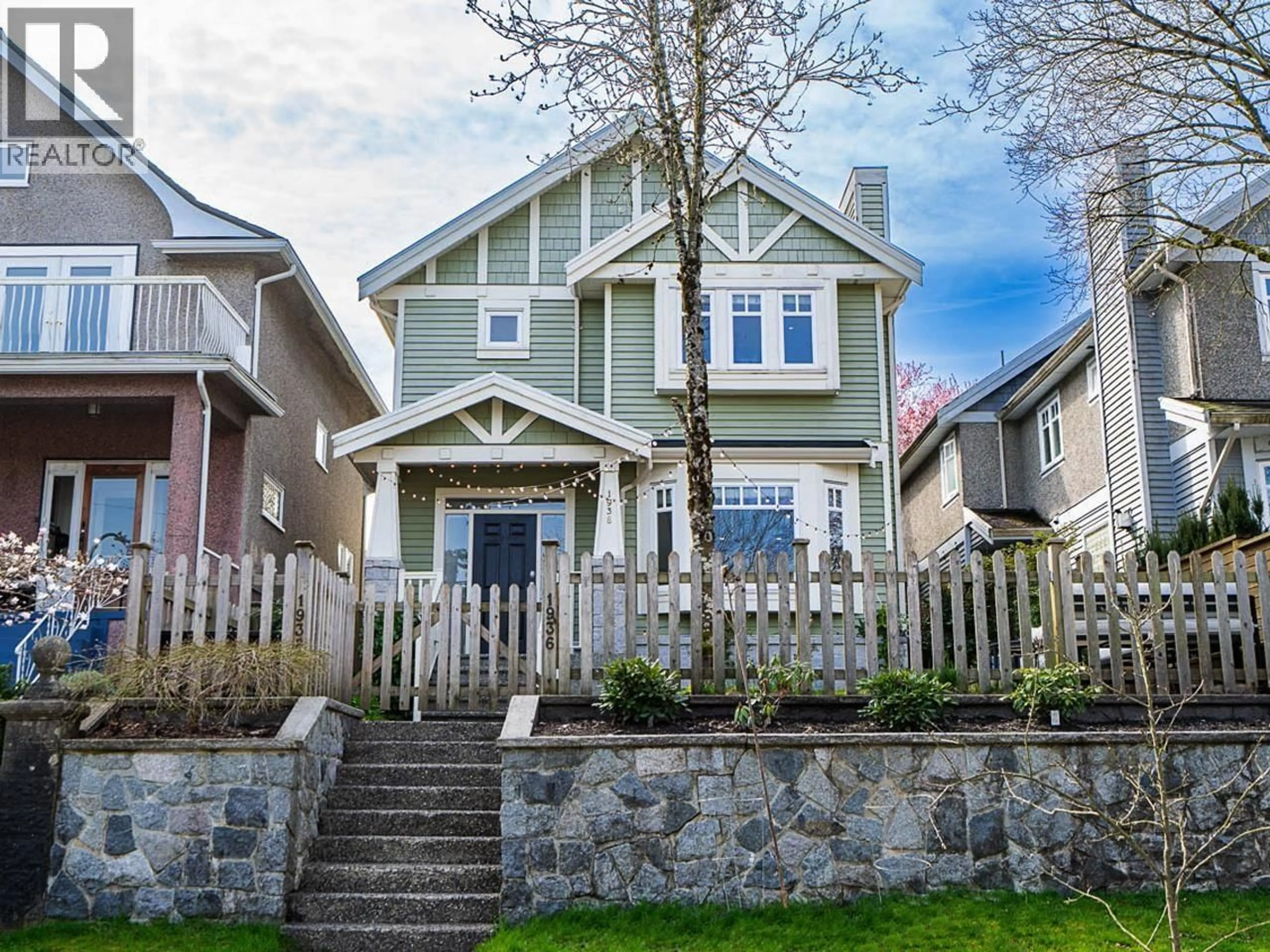 Home with vinyl exterior material, street for 1938 ADANAC STREET, Vancouver British Columbia V5L2E4