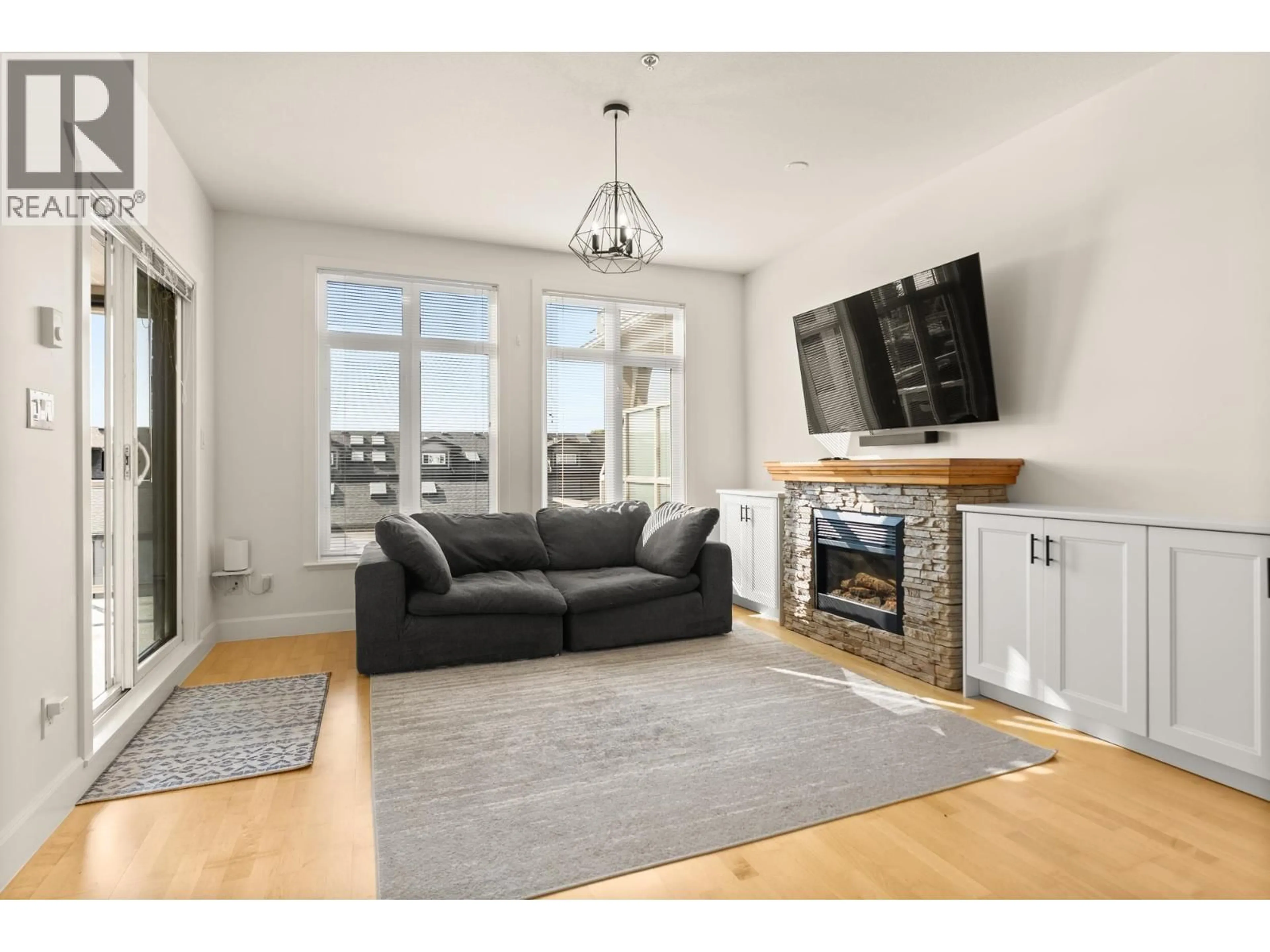 Living room with furniture, unknown for 311 - 4280 MONCTON STREET, Richmond British Columbia V7E6T4