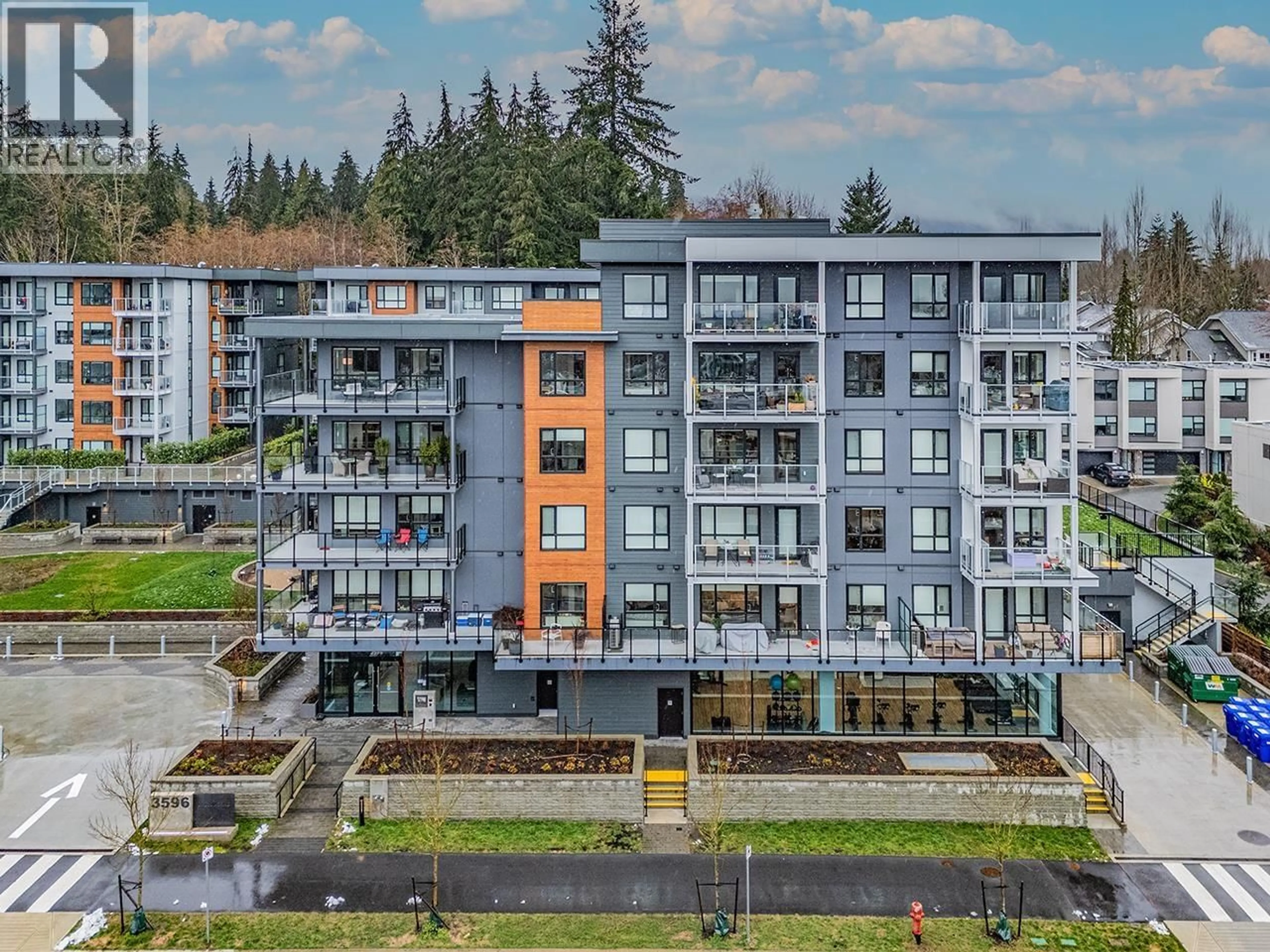 A pic from outside/outdoor area/front of a property/back of a property/a pic from drone, unknown for 303 - 3596 MALSUM DRIVE, North Vancouver British Columbia V7G0B5