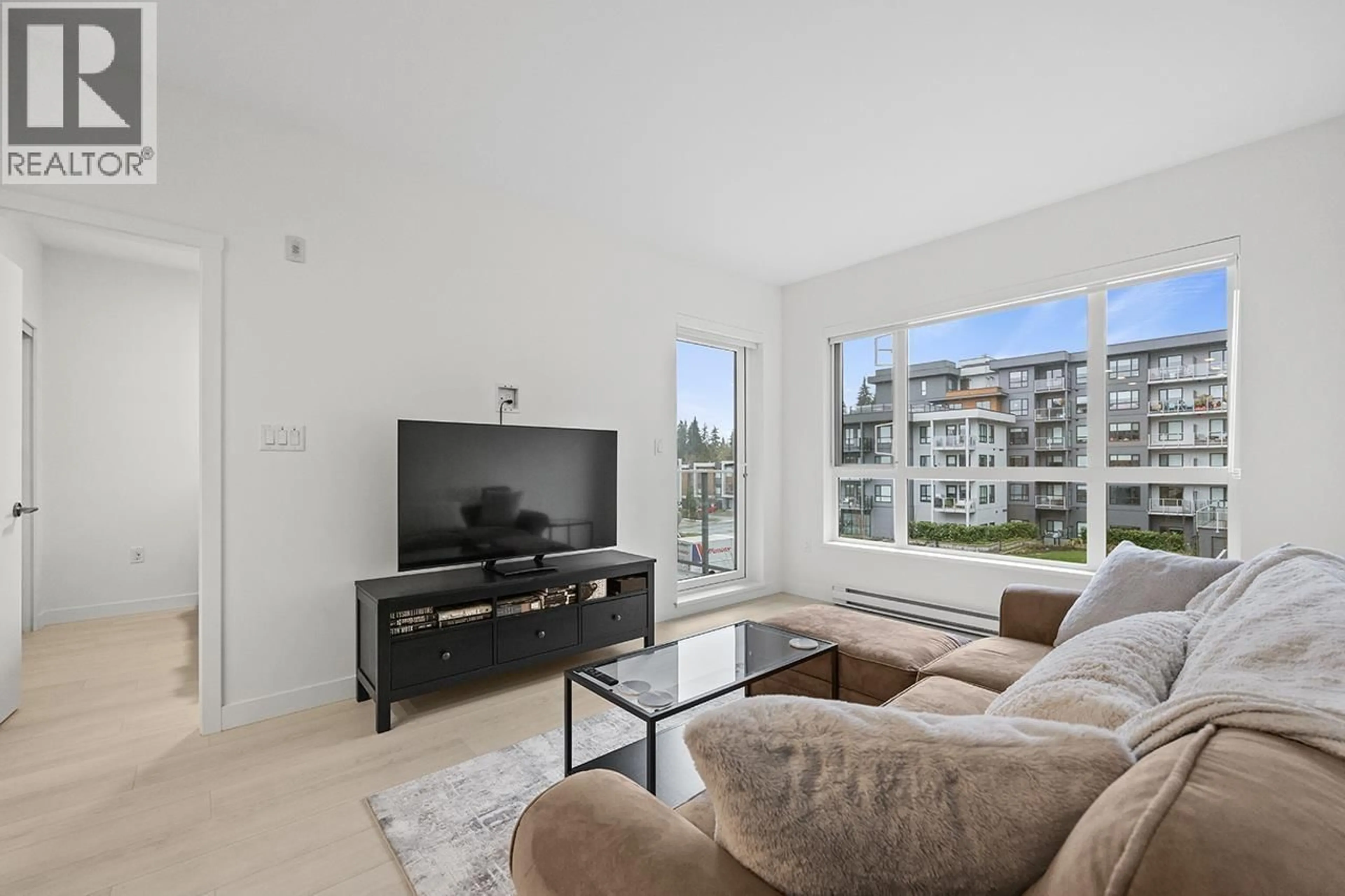 Living room with furniture, unknown for 303 - 3596 MALSUM DRIVE, North Vancouver British Columbia V7G0B5