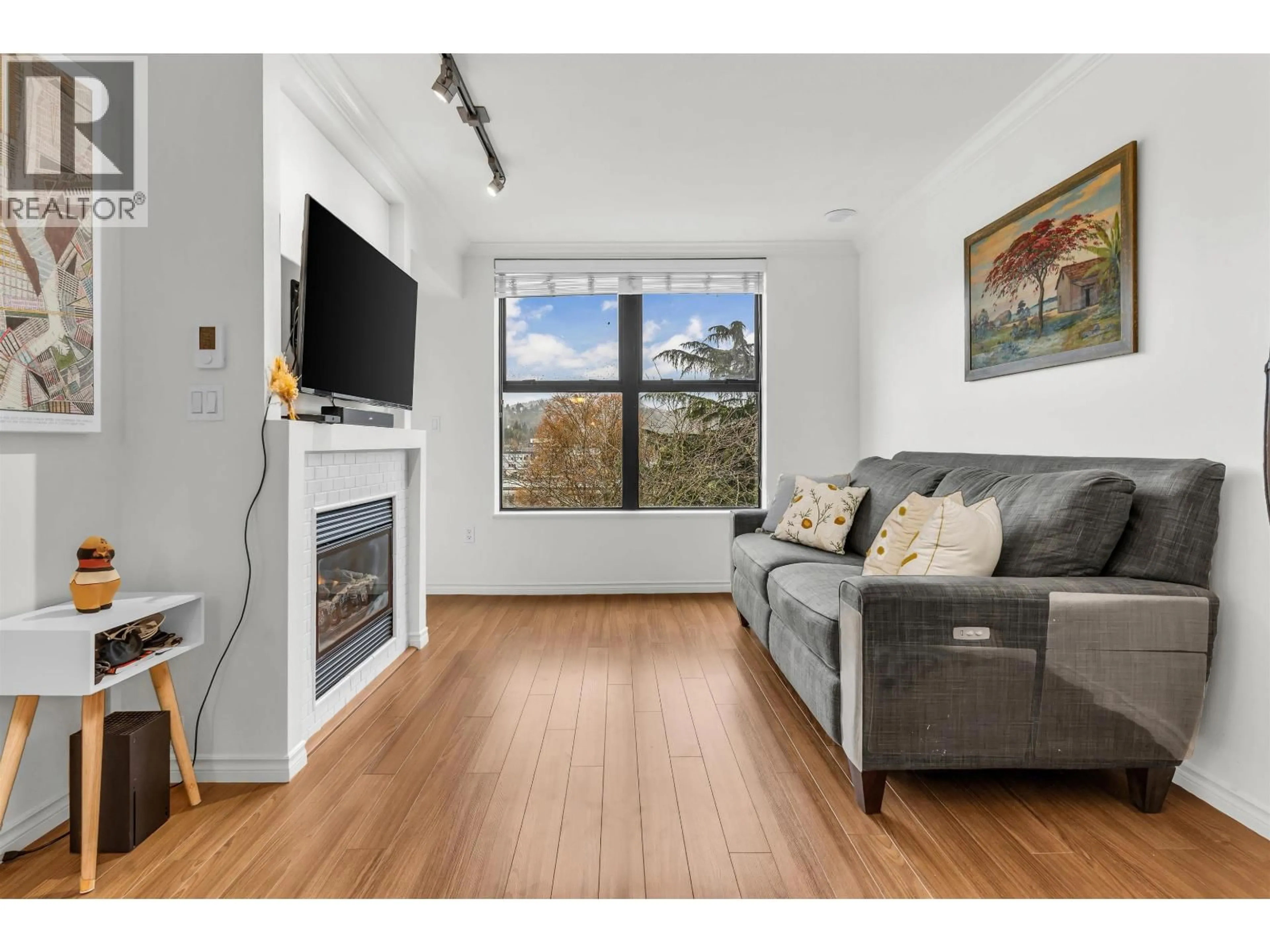 Living room with furniture, wood/laminate floor for 4011 - 84 GRANT STREET, Port Moody British Columbia V3H0B5