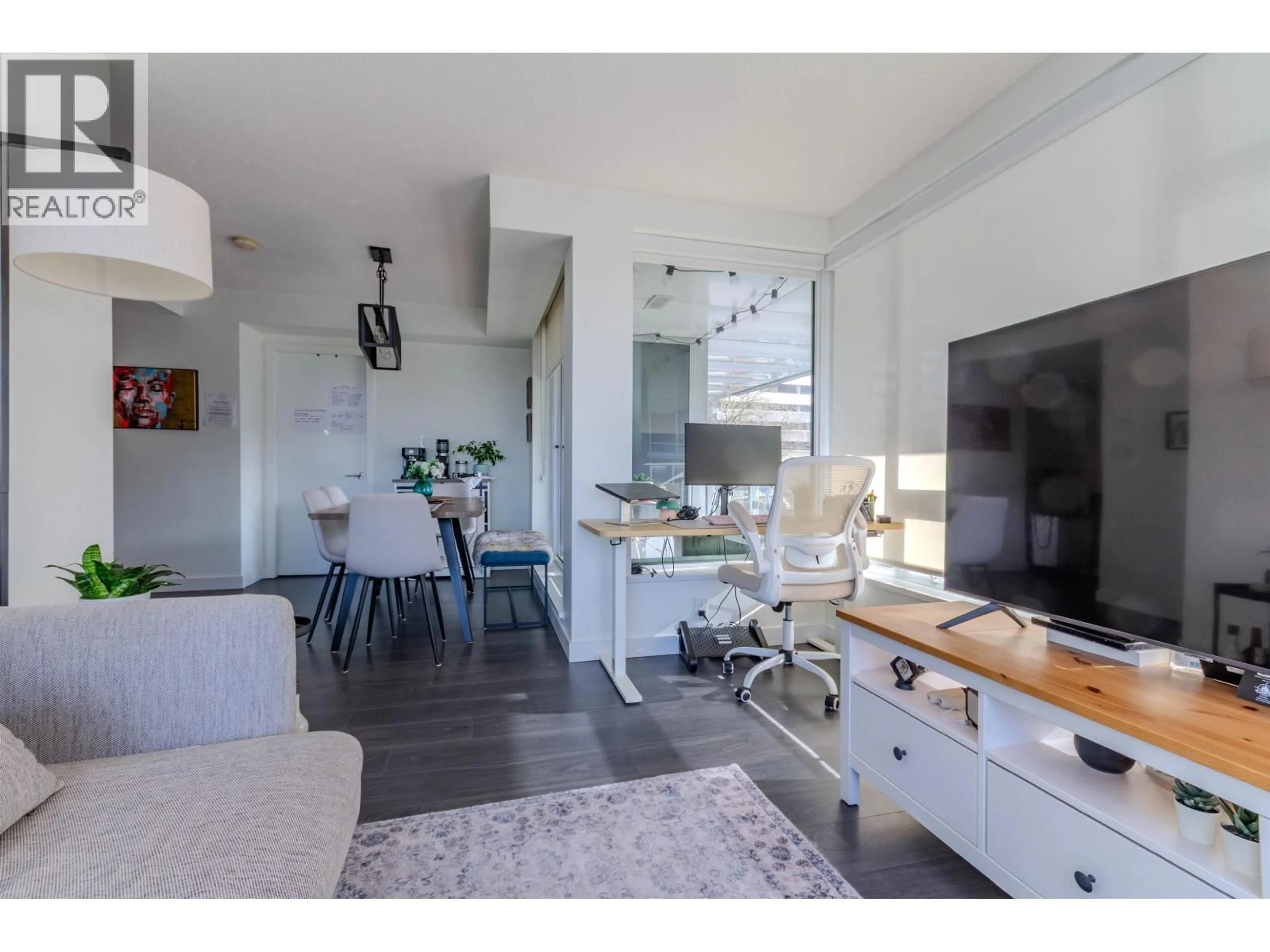 Open concept kitchen, wood/laminate floor for 207 - 5515 BOUNDARY ROAD, Vancouver British Columbia V5R0E3