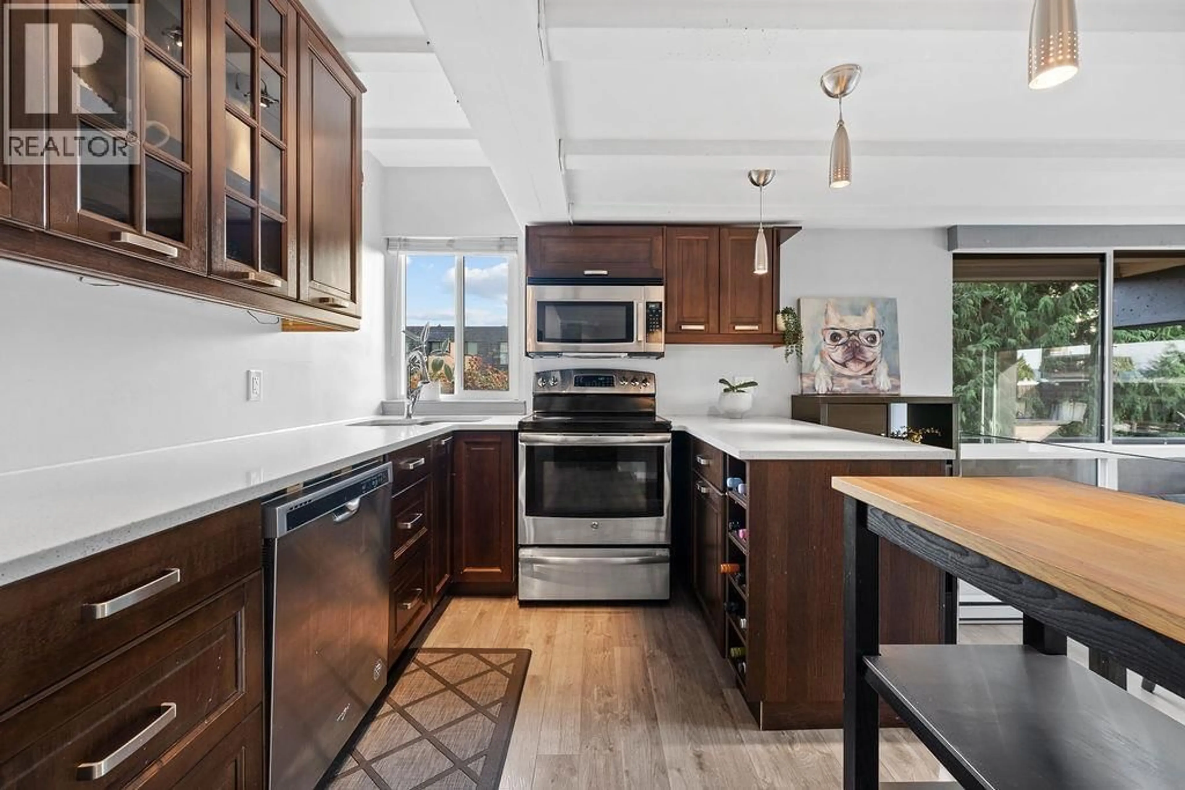 Open concept kitchen, ceramic/tile floor for 201 - 341 MAHON AVENUE, North Vancouver British Columbia V7M3E1