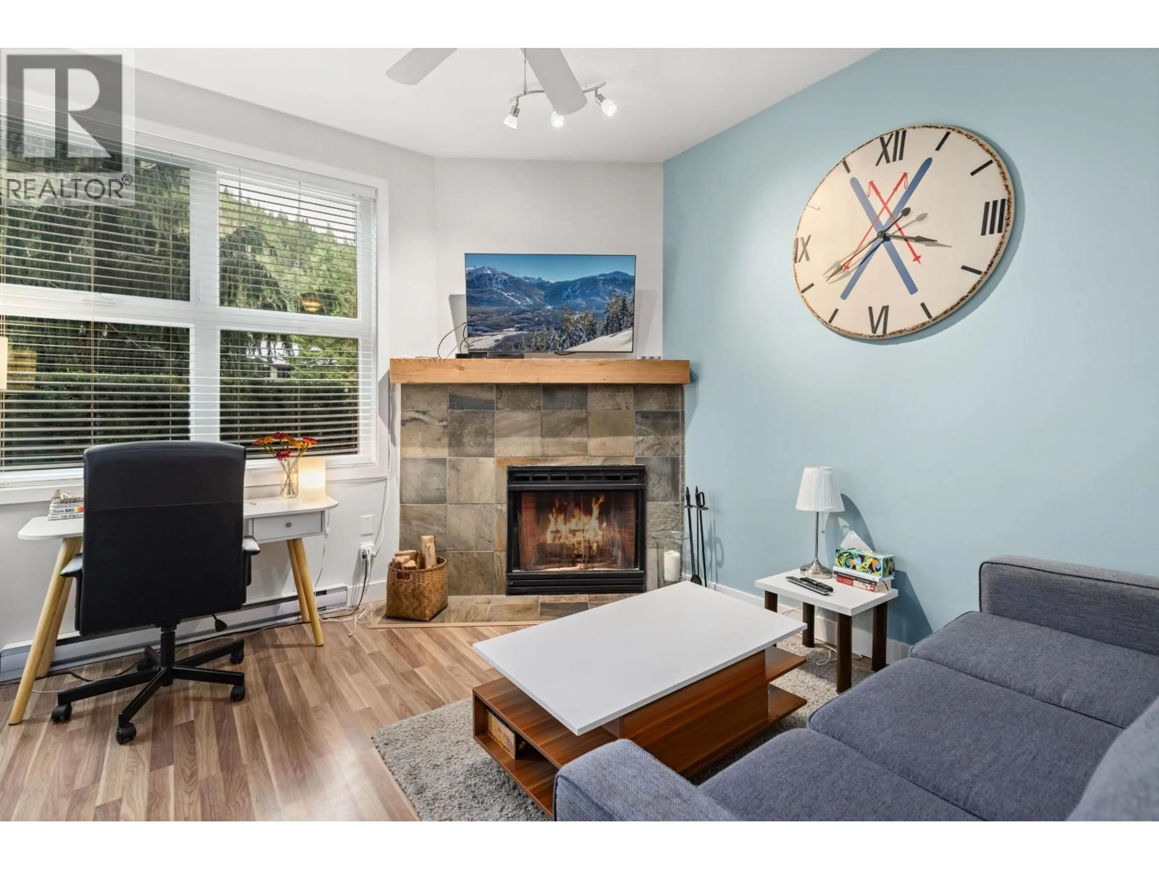 Living room with furniture, wood/laminate floor for 12 - 2213 MARMOT PLACE, Whistler British Columbia V8E0H3