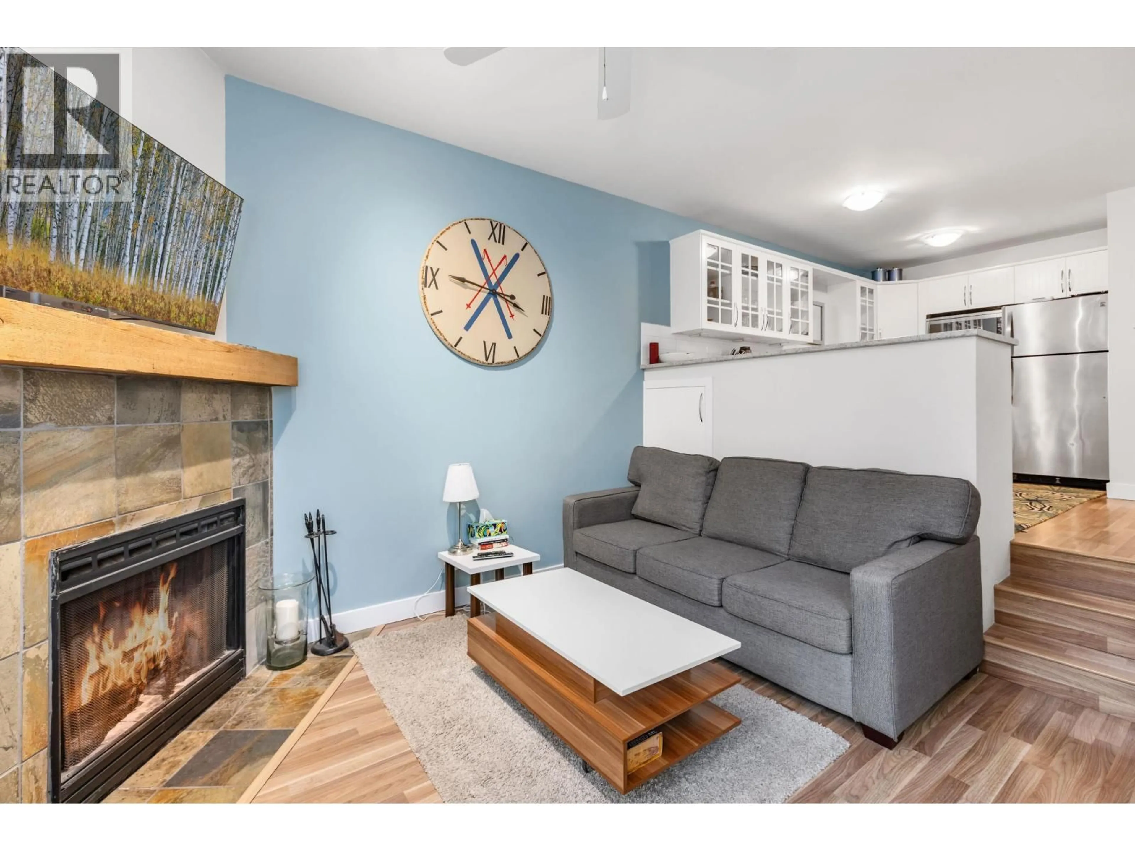 Living room with furniture, wood/laminate floor for 12 - 2213 MARMOT PLACE, Whistler British Columbia V8E0H3