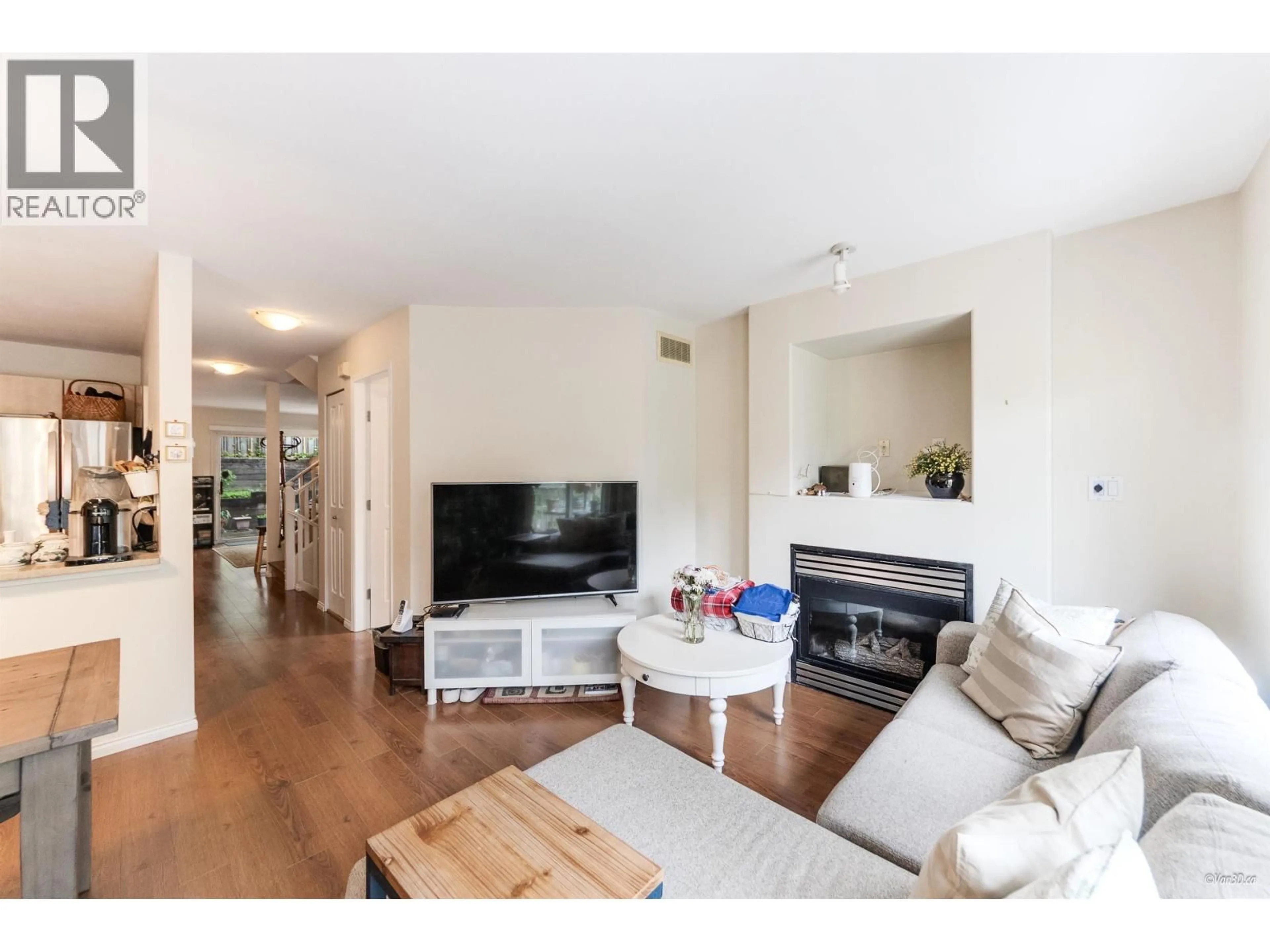 Living room with furniture, wood/laminate floor for 15 - 8701 16TH AVENUE, Burnaby British Columbia V3N5B5