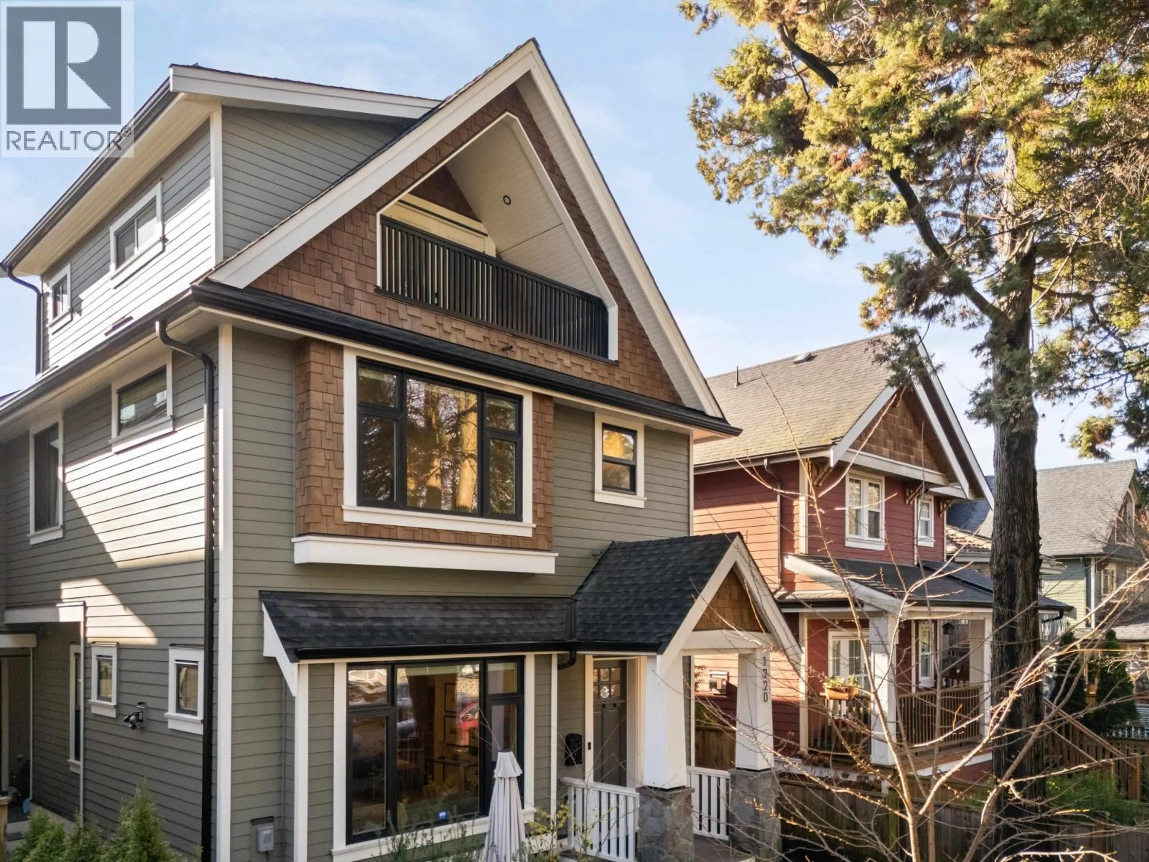 Home with vinyl exterior material, street for 1220 11TH AVENUE, Vancouver British Columbia V5T2G3