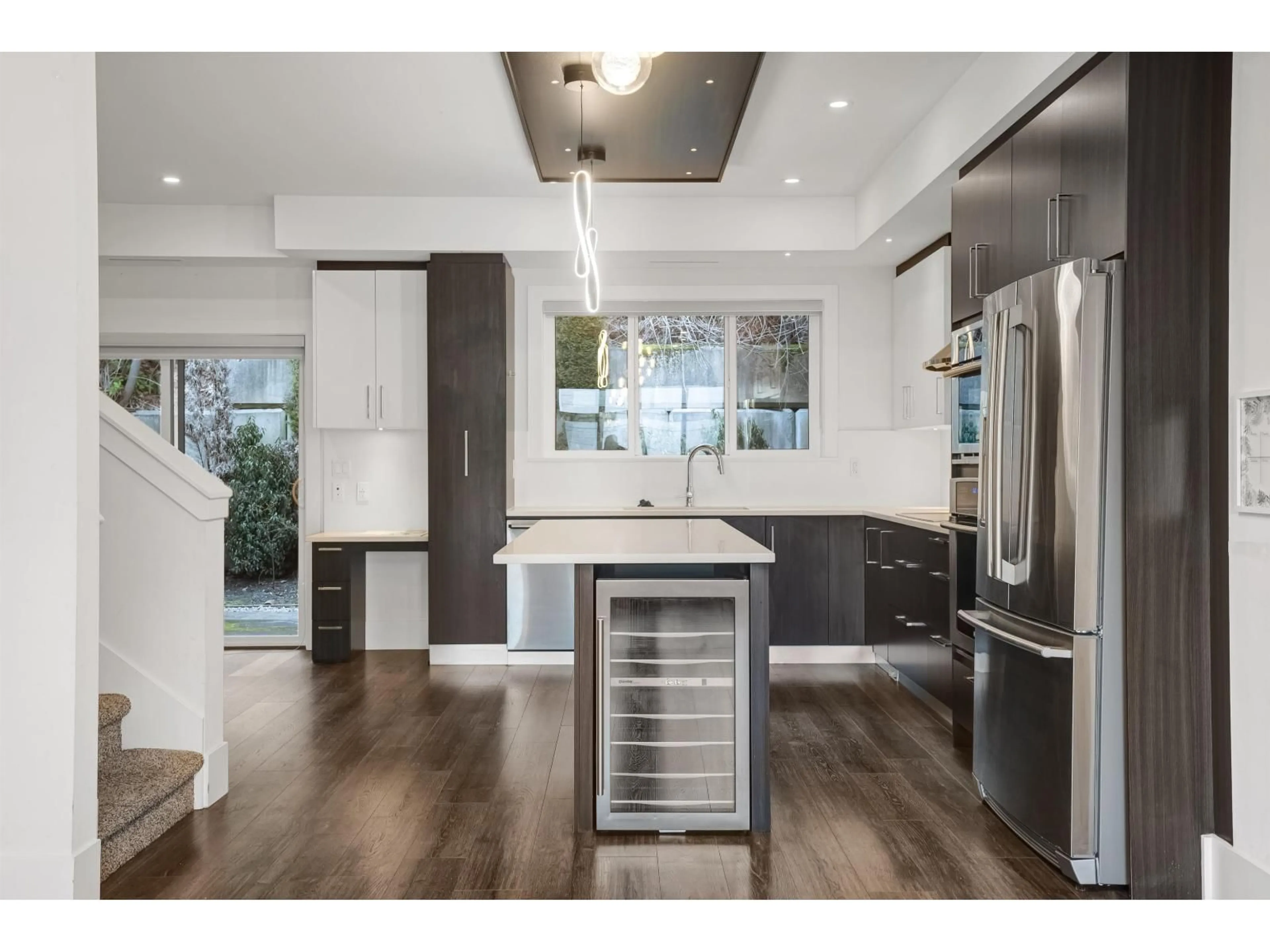 Open concept kitchen, wood/laminate floor for 49 - 15177 60 AVENUE, Surrey British Columbia V3S7B3