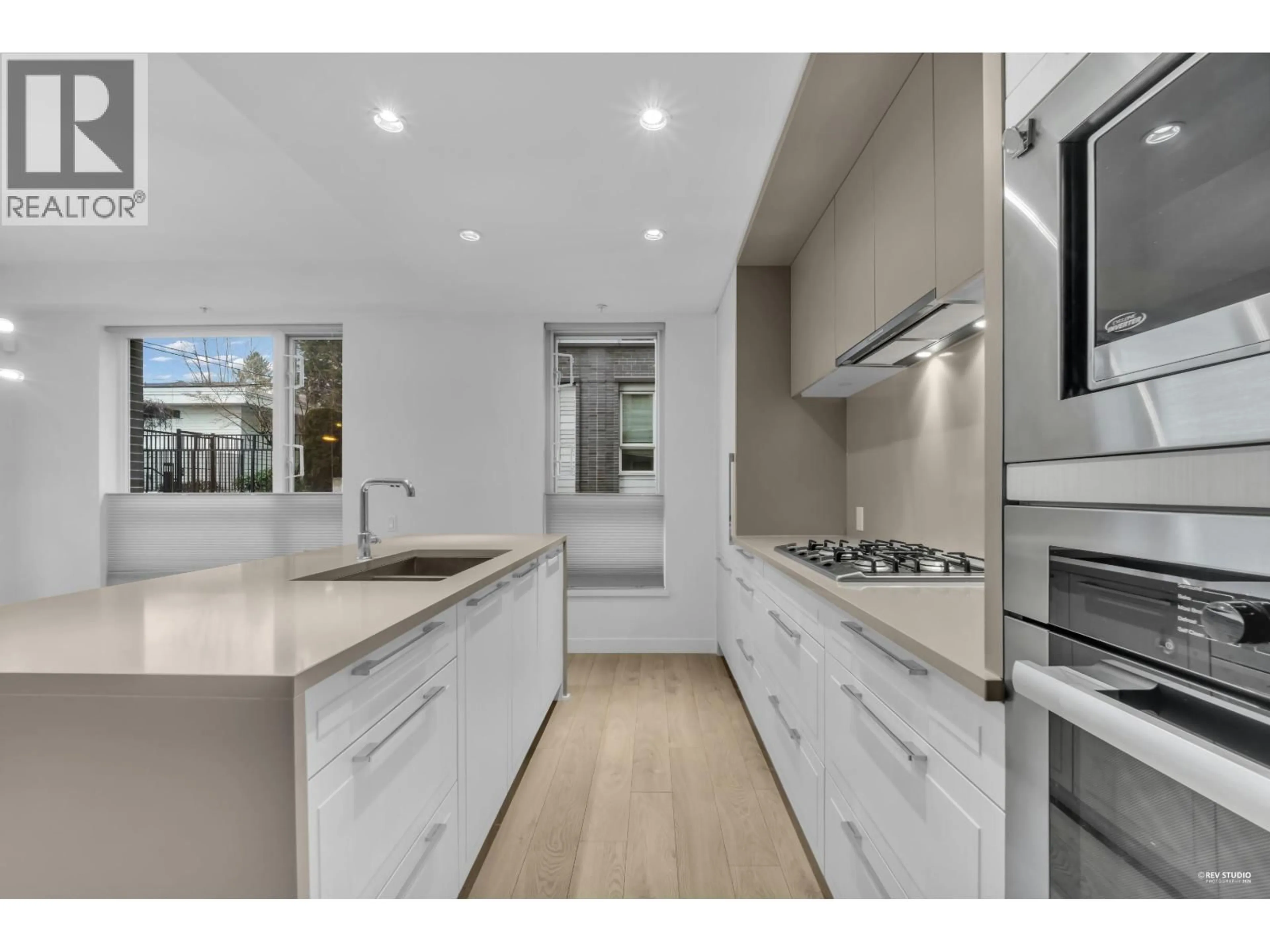 Open concept kitchen, unknown for 109 - 6677 CAMBIE STREET, Vancouver British Columbia V6P0E6